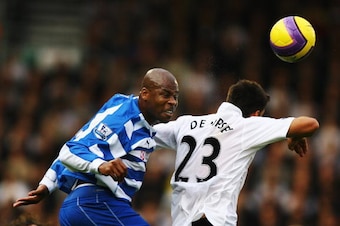 LONDON - NOVEMBER 03:  Michael Duberry (L) of Reading challenges Clint Dempsey (R) of Fulham in the air for the ball during the Barclays Premier League match between Fulham and Reading at Craven Cottage on November 3, 2007 in London, England.  (Photo by R