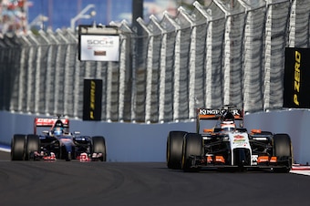 SOCHI, RUSSIA - OCTOBER 12:  Nico Hulkenberg of Germany and Force India and Jean-Eric Vergne of France and Scuderia Toro Rosso drive during the Russian Formula One Grand Prix at Sochi Autodrom on October 12, 2014 in Sochi, Russia.  (Photo by Clive Mason/G