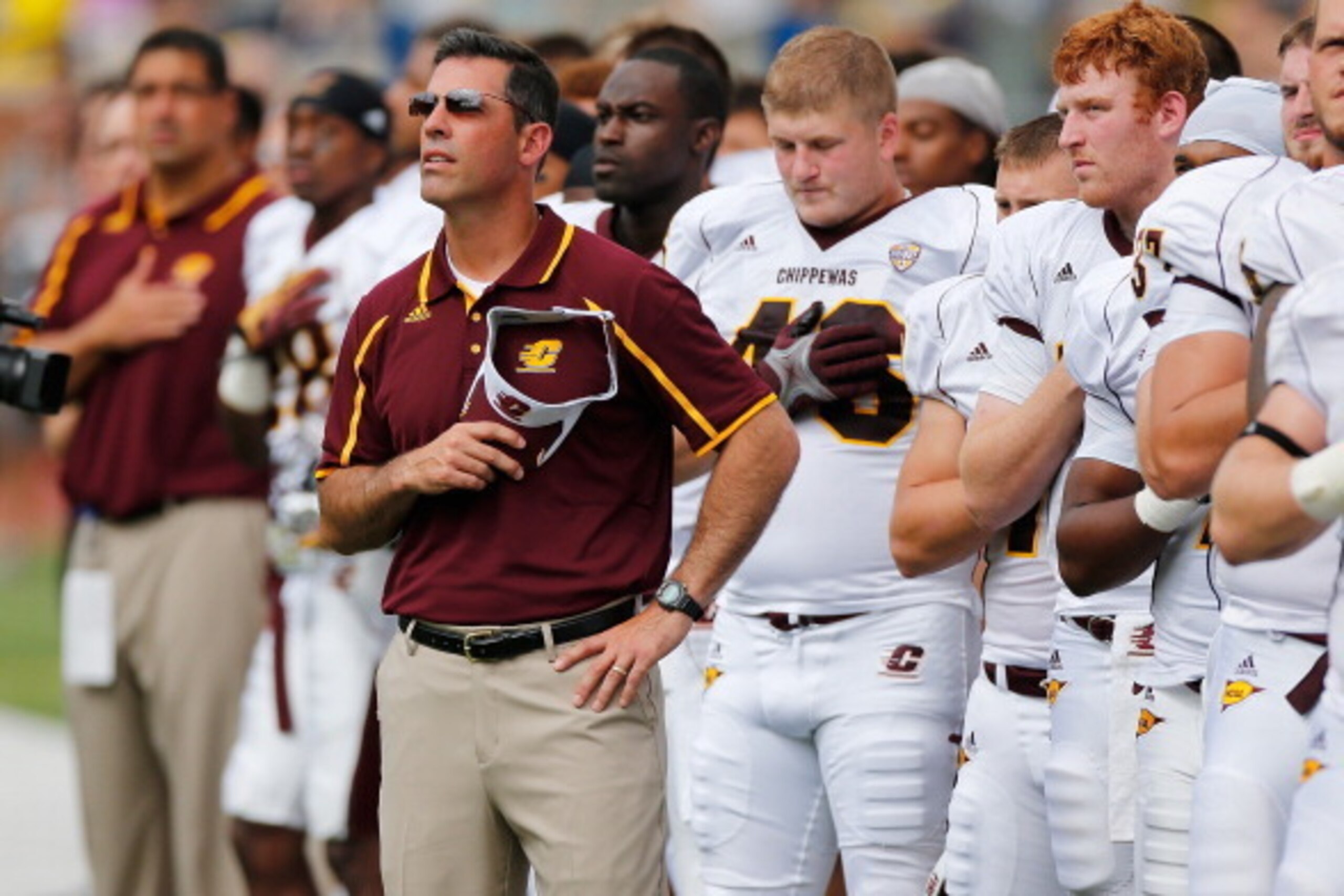 ANN ARBOR, MI - AUGUST 31: Central Michigan Chippewas head coach Dan Enos watches pre-game festivities prior to playing the Michigan Wolverines at Michigan Stadium on August 31, 2013 in Ann Arbor, Michigan.  (Photo by Gregory Shamus/Getty Images)