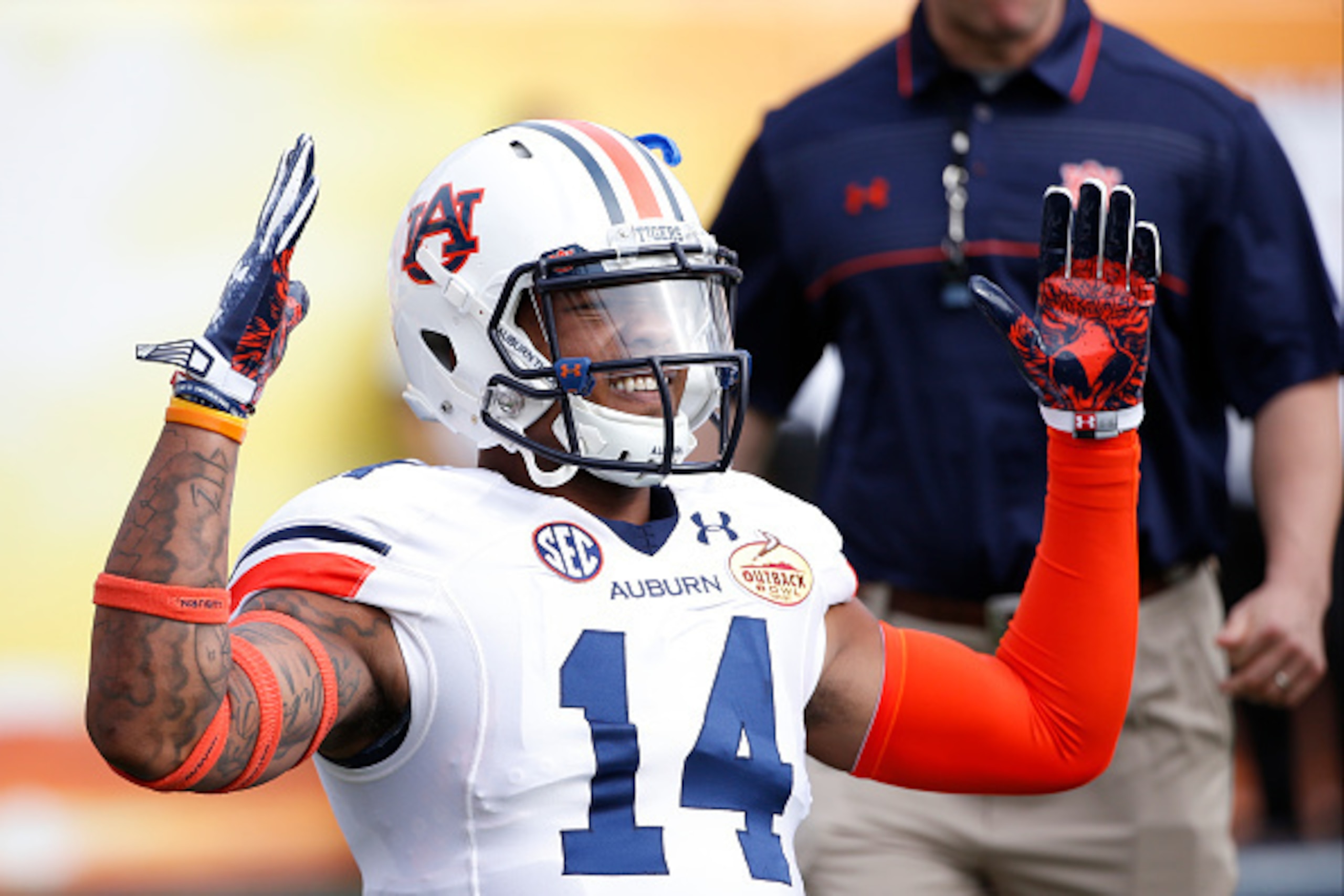 TAMPA, FL - JANUARY 1: Quarterback Nick Marshall #14 of the Auburn Tigers warms up before the start of the Outback Bowl against the Wisconsin Badgers on January 1, 2015 at Raymond James Stadium in Tampa, Florida.  (Photo by Brian Blanco/Getty Images)
