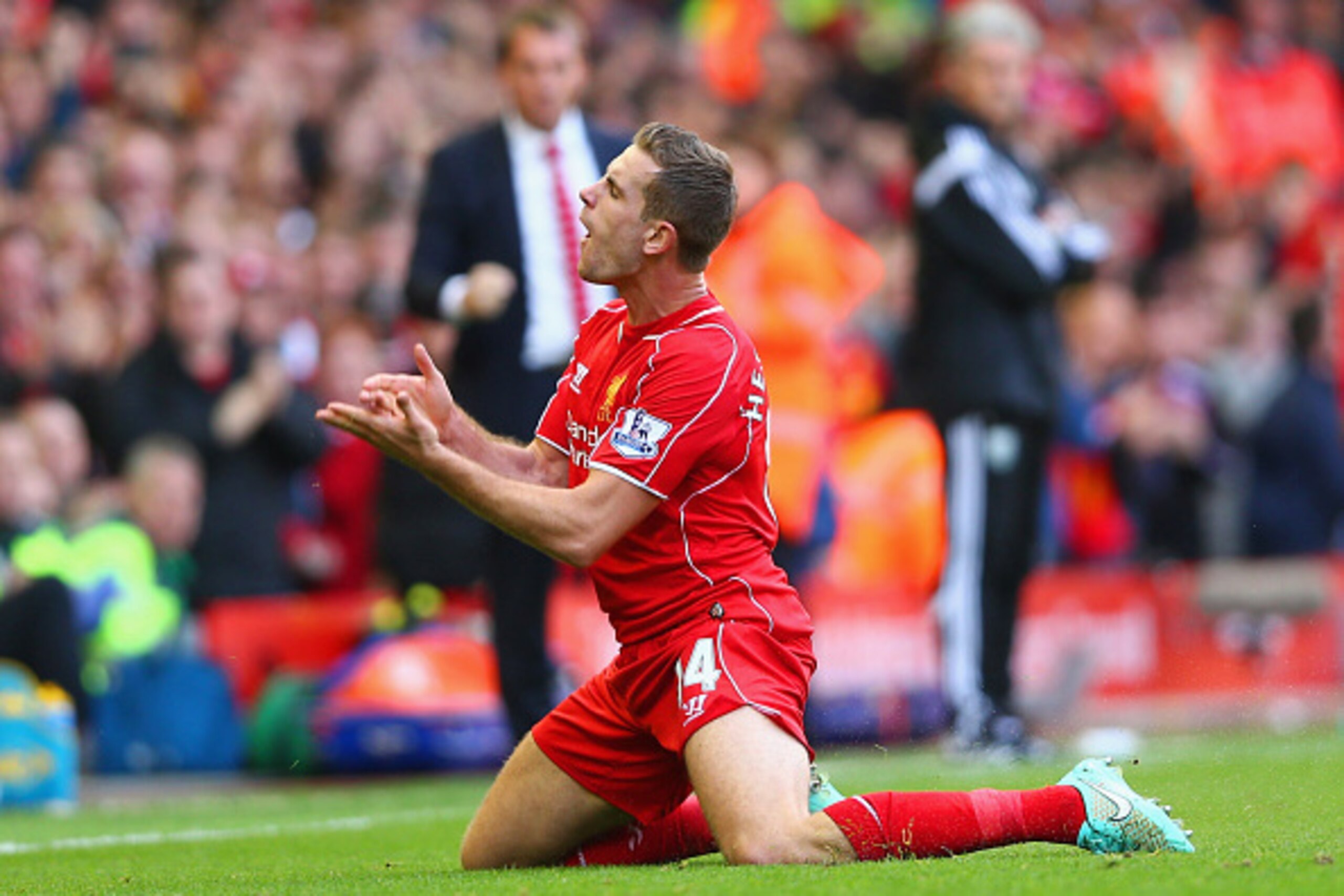 LIVERPOOL, ENGLAND - OCTOBER 04:  Jordan Henderson of Liverpool celebrates scoring their second goal during the Barclays Premier League match between Liverpool and West Bromwich Albion at Anfield on October 4, 2014 in Liverpool, England.  (Photo by Clive 