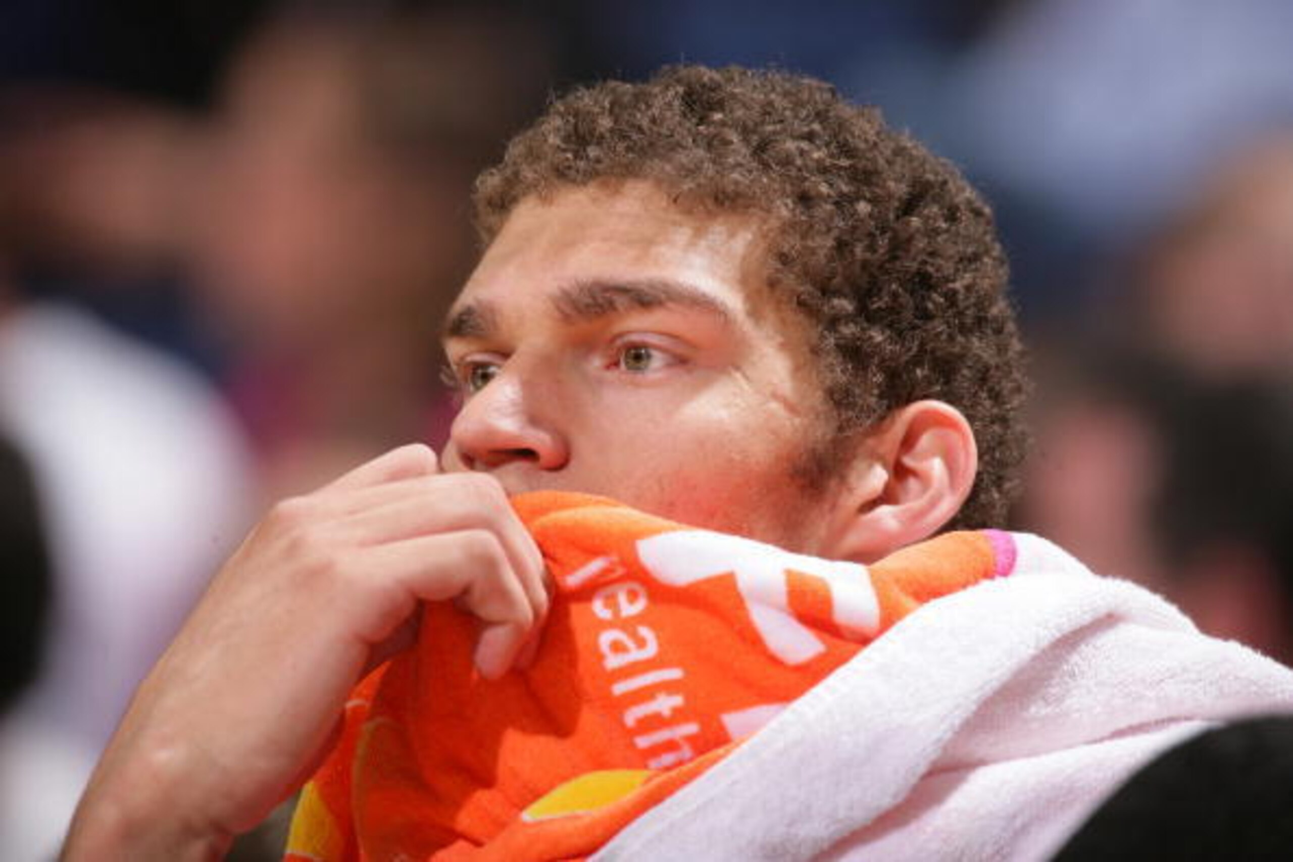 OAKLAND, CA - MARCH 11:  Brook Lopez #11 of the New Jersey Nets looks on from the bench during the game against the Golden State Warriors at Oracle Arena on March 11, 2009 in Oakland, California.  The Warriors won 116-112.  NOTE TO USER: User expressly ac