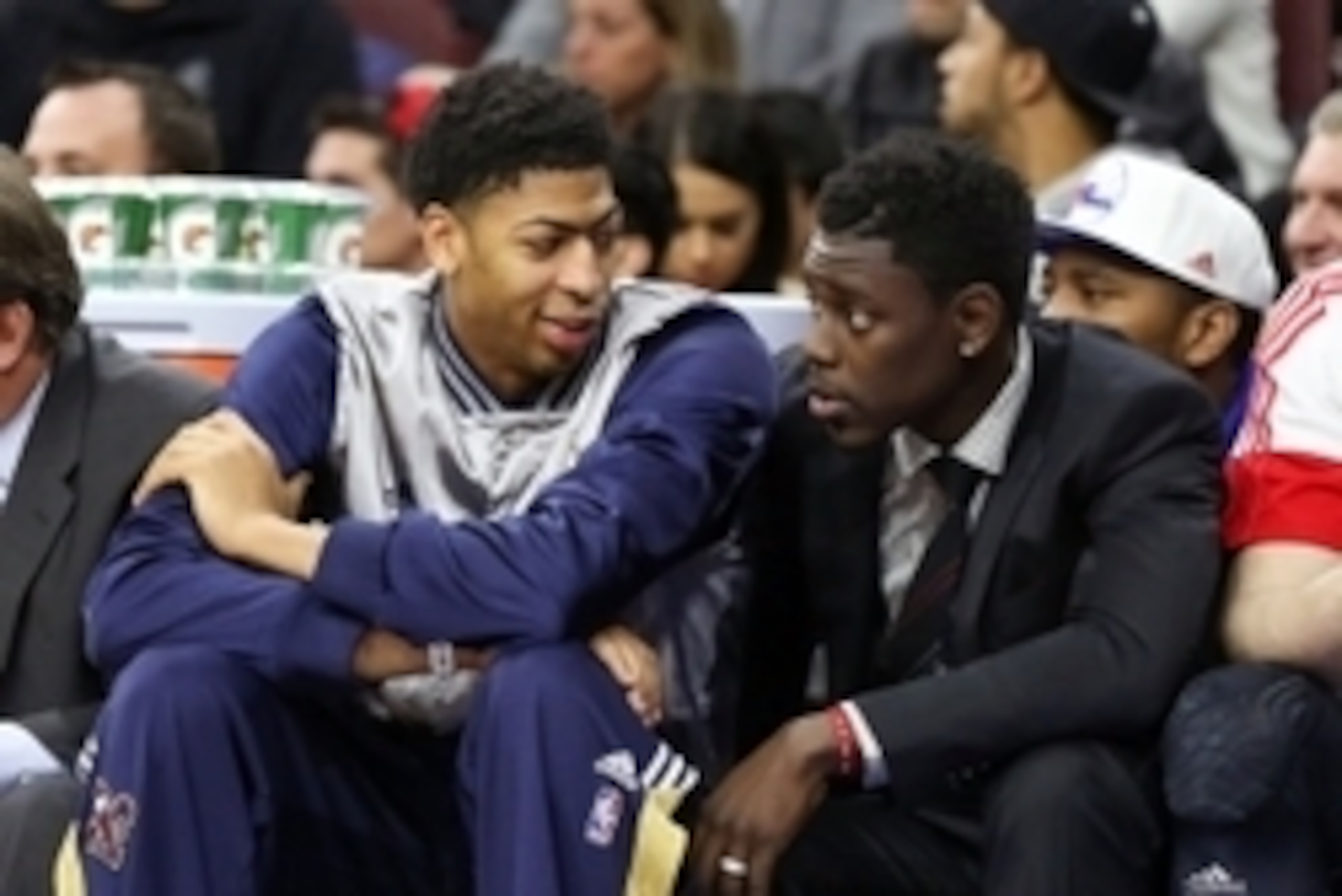 Jan 16, 2015; Philadelphia, PA, USA; New Orleans Pelicans forward Anthony Davis (23) and guard Jrue Holiday (11) sit on the bench during the game against the Philadelphia 76ers at Wells Fargo Center. Mandatory Credit: Bill Streicher-USA TODAY Sports