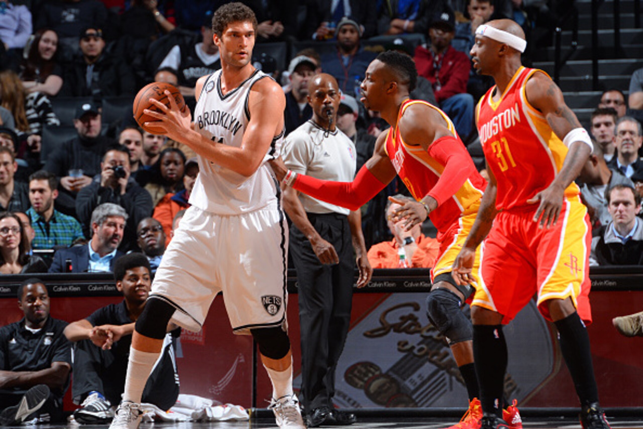 BROOKLYN, NY - JANUARY 12: Brook Lopez #11 of the Brooklyn Nets backs up to the basket against the Houston Rockets at the Barclays Center on January 12, 2015 in Brooklyn, NY NOTE TO USER: User expressly acknowledges and agrees that, by downloading and/or 