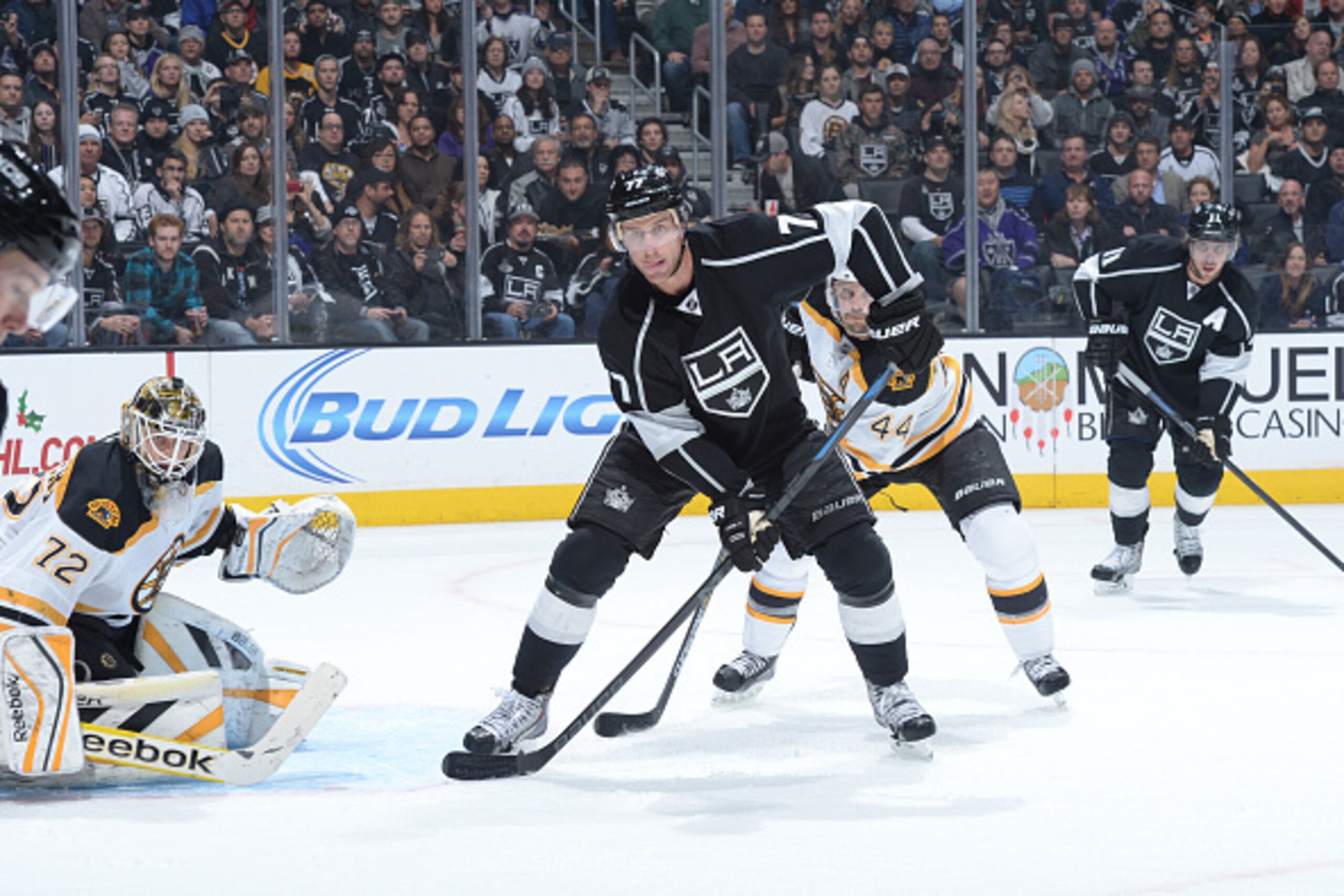 LOS ANGELES, CA - DECEMBER 02: Jeff Carter #77 of the Los Angeles Kings looks for the puck against Niklas Svedberg #72 and Dennis Seidenberg #44 of the Boston Bruins while Anze Kopitar #11 of the Los Angeles Kings looks on at STAPLES Center on December 02