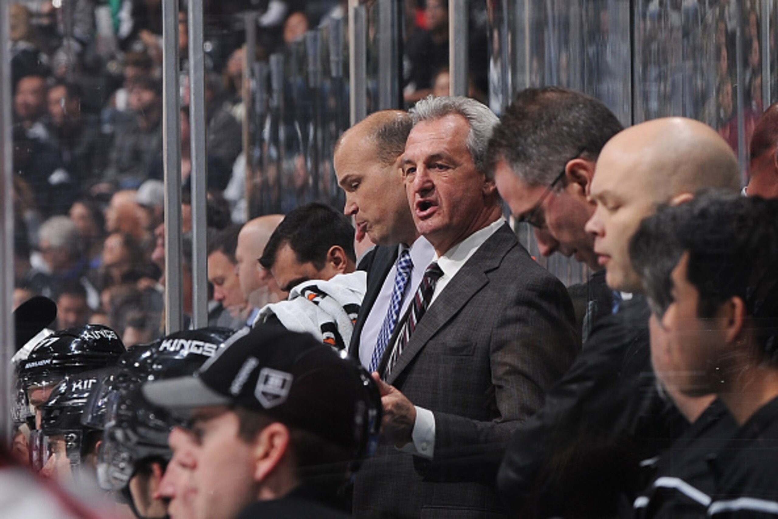 LOS ANGELES, CA - DECEMBER 20: Darryl Sutter of the Los Angeles Kings speaks to his team during a game against the Arizona Coyotes at STAPLES Center on December 20, 2014 in Los Angeles, California. (Photo by Juan Ocampo/NHLI via Getty Images)