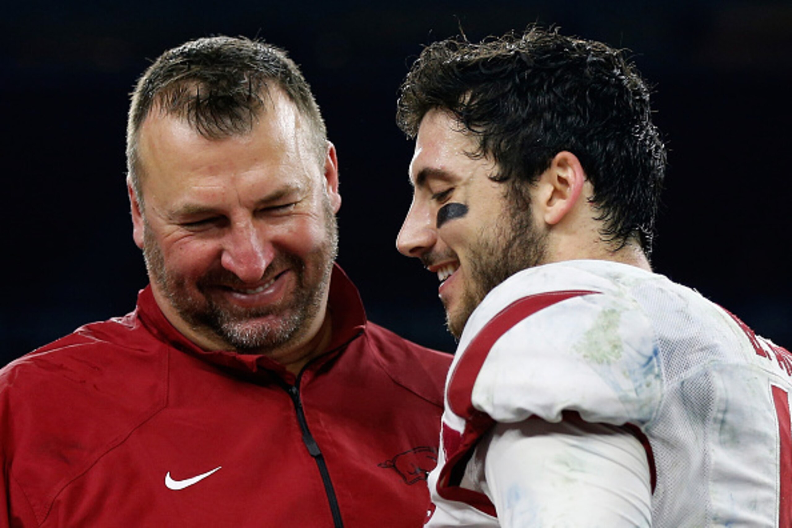 HOUSTON, TX - DECEMBER 29:  Head coach Bret Bielema of the Arkansas Razorbacks celebrates with his MVP quarterback Brandon Allen #10  after the Arkansas Razorbacks defeated the Texas Longhorns 31-7 at the AdvoCare V100 Texas Bowl at NRG Stadium on Decembe