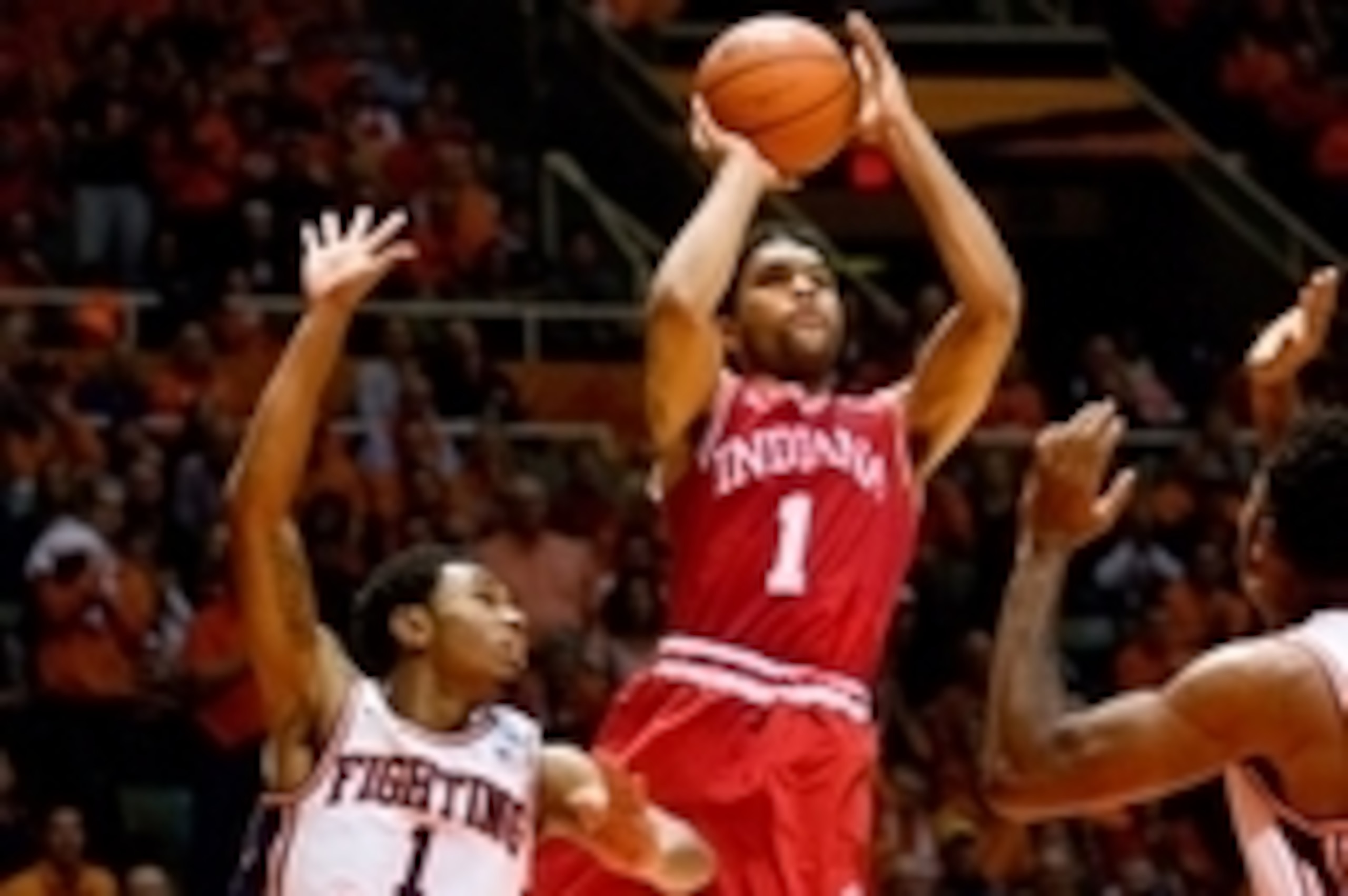 Jan 18, 2015; Champaign, IL, USA; Indiana Hoosiers guard James Blackmon Jr. (1) takes a jump shot defended by Illinois Fighting Illini guard Jaylon Tate (1) at State Farm Center. Indiana beat Illinois 80 to 74.  Mandatory Credit: Mike Granse-USA TODAY Spo