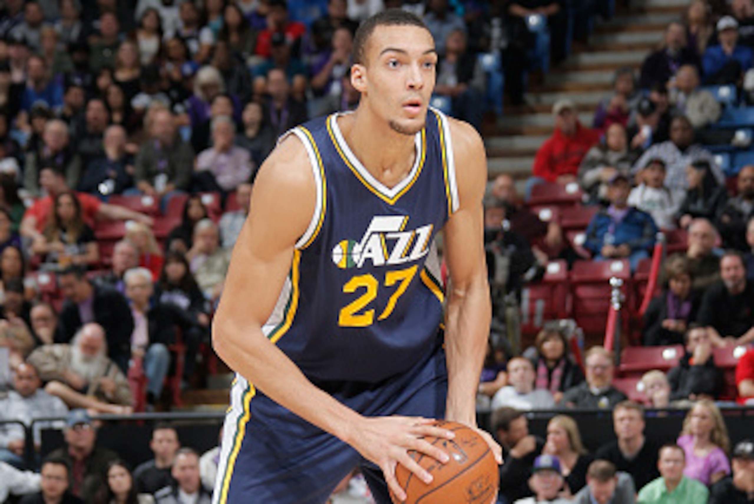 SACRAMENTO, CA - DECEMBER 8: Rudy Gobert #27 of the Utah Jazz handles the ball against the Sacramento Kings on December 8, 2014 at Sleep Train Arena in Sacramento, California. NOTE TO USER: User expressly acknowledges and agrees that, by downloading and o