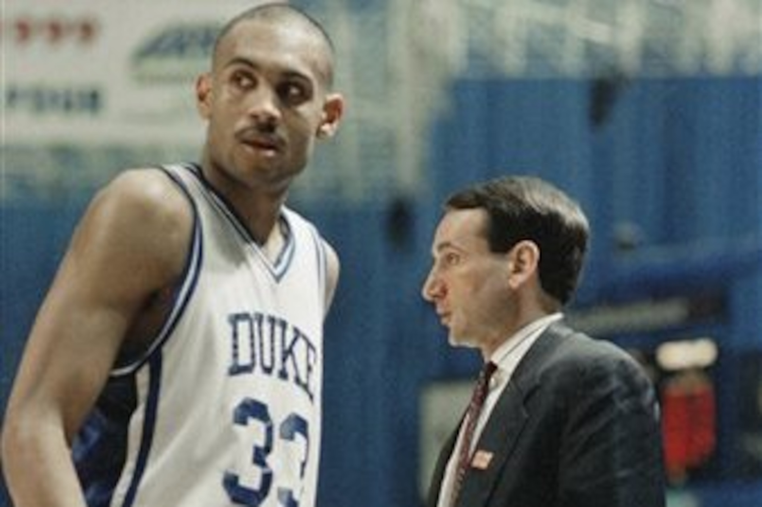 Hill and Krzyzewski during their time together in Durham.
