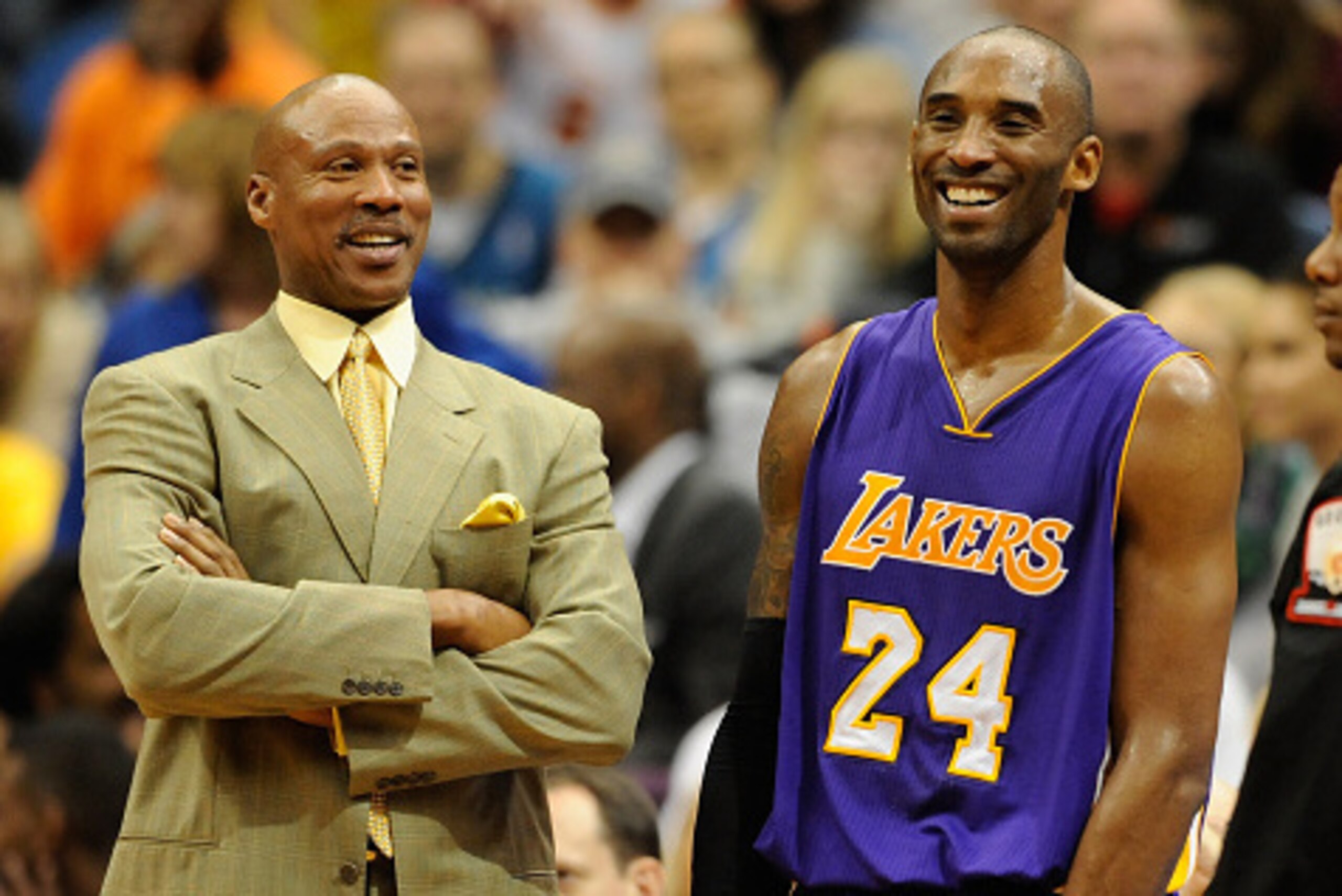 MINNEAPOLIS, MN - DECEMBER 14: Byron Scott of the Los Angeles Lakers speaks with Kobe Bryant #24 during a time out in the fourth quarter of the game against the Minnesota Timberwolves on December 14, 2014 at Target Center in Minneapolis, Minnesota. The La MINNEAPOLIS, MN - DECEMBER 14: Byron Scott of the Los Angeles Lakers speaks with Kobe Bryant #24 during a time out in the fourth quarter of the game against the Minnesota Timberwolves on December 14, 2014 at Target Center in Minneapolis, Minnesota. The La