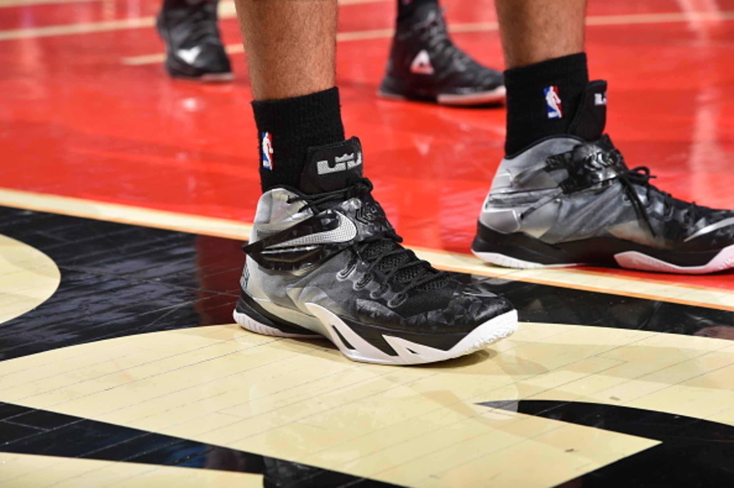 CHICAGO,IL - JANUARY 22: Danny Green #14 of the San Antonio Spurs honors Stewart Scott with custom sneakers with Stewarts catch phrases on them prior to the game against the Chicago Bulls at the United Center on January 21, 2015 in Chicago, Illinois . NOT