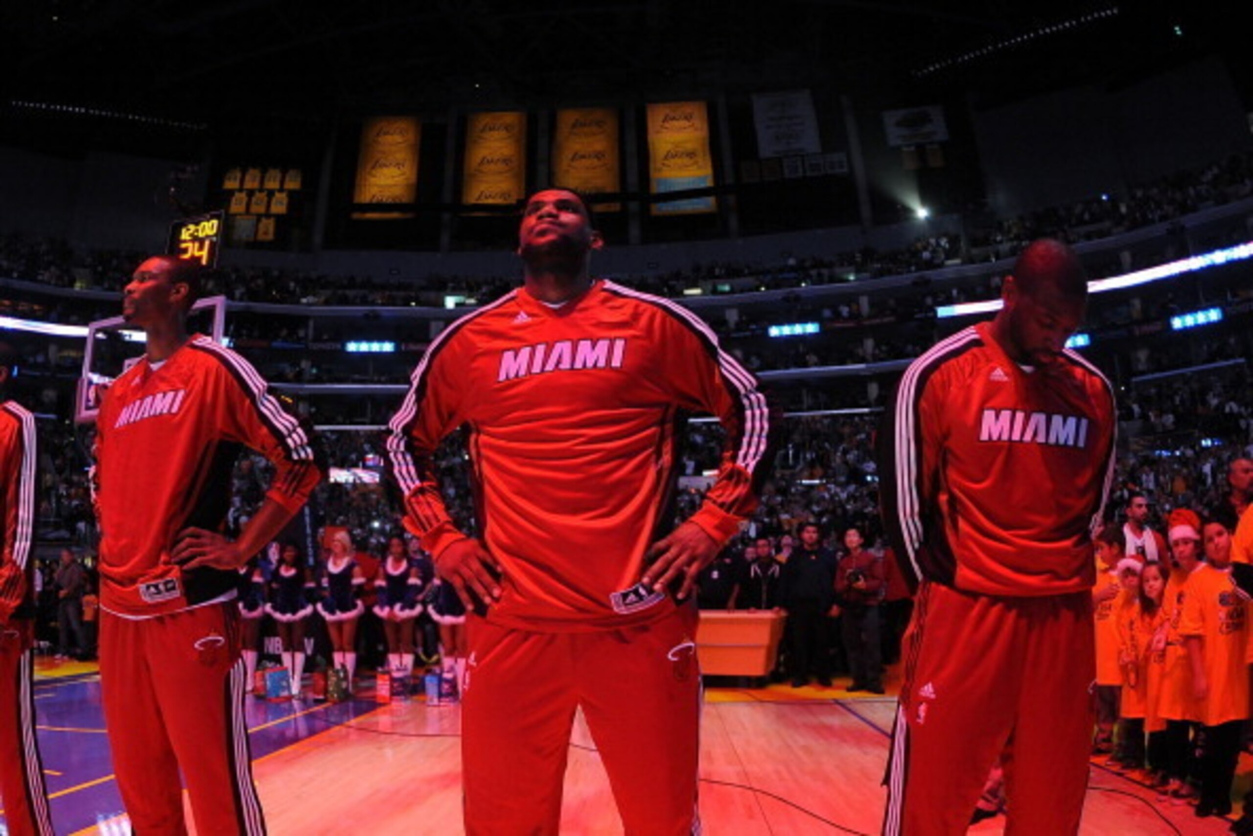 LOS ANGELES - DECEMBER 25:  (L-R) Chris Bosh #1, LeBron James #6, and Dwyane Wade #3 of the Miami Heat look on before their game against the Los Angeles Lakers at Staples Center on December 25, 2010 in Los Angeles, California. NOTE TO USER: User expressly