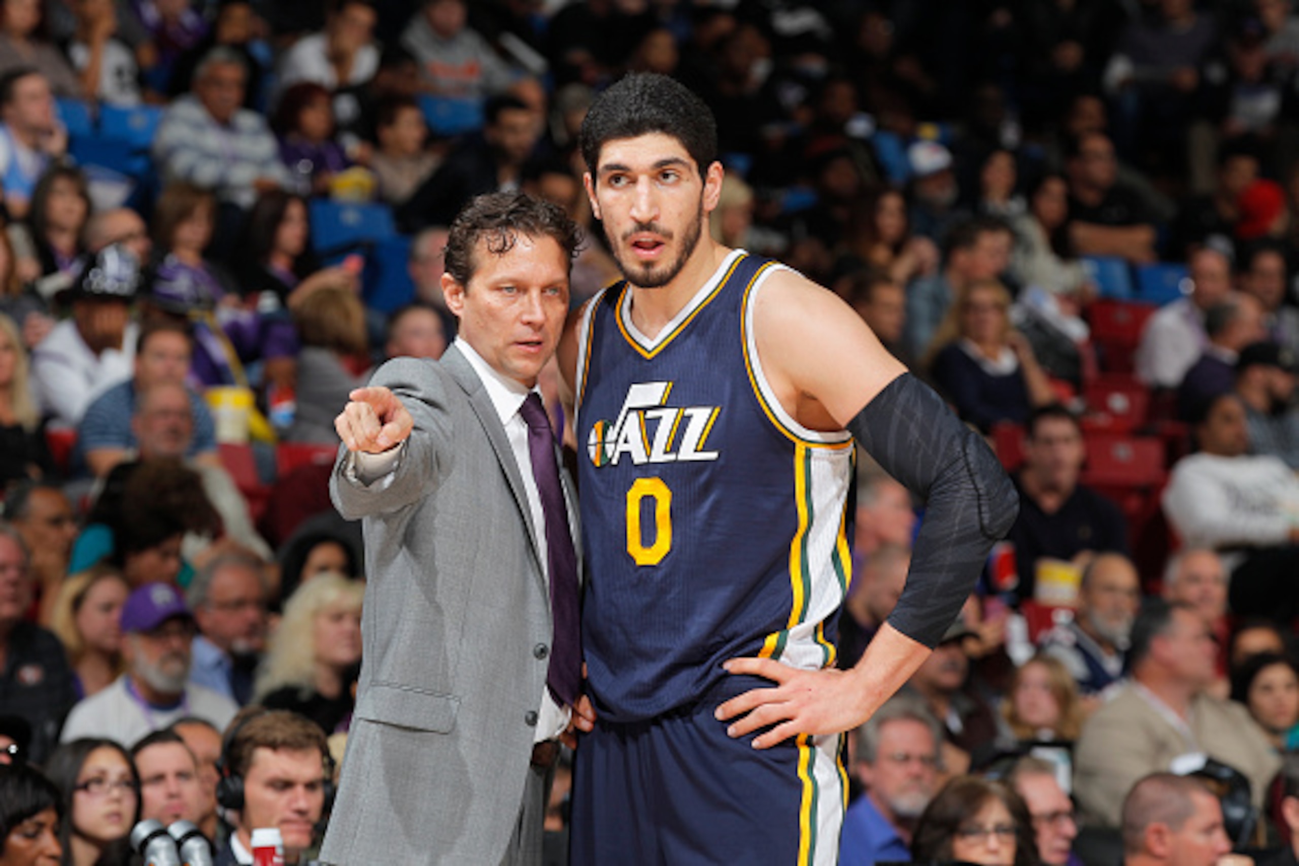 SACRAMENTO, CA - DECEMBER 8: Head Coach Quin Synder of the Utah Jazz coaches Enes Kanter #0 against the Sacramento Kings on December 8, 2014 at Sleep Train Arena in Sacramento, California. NOTE TO USER: User expressly acknowledges and agrees that, by down