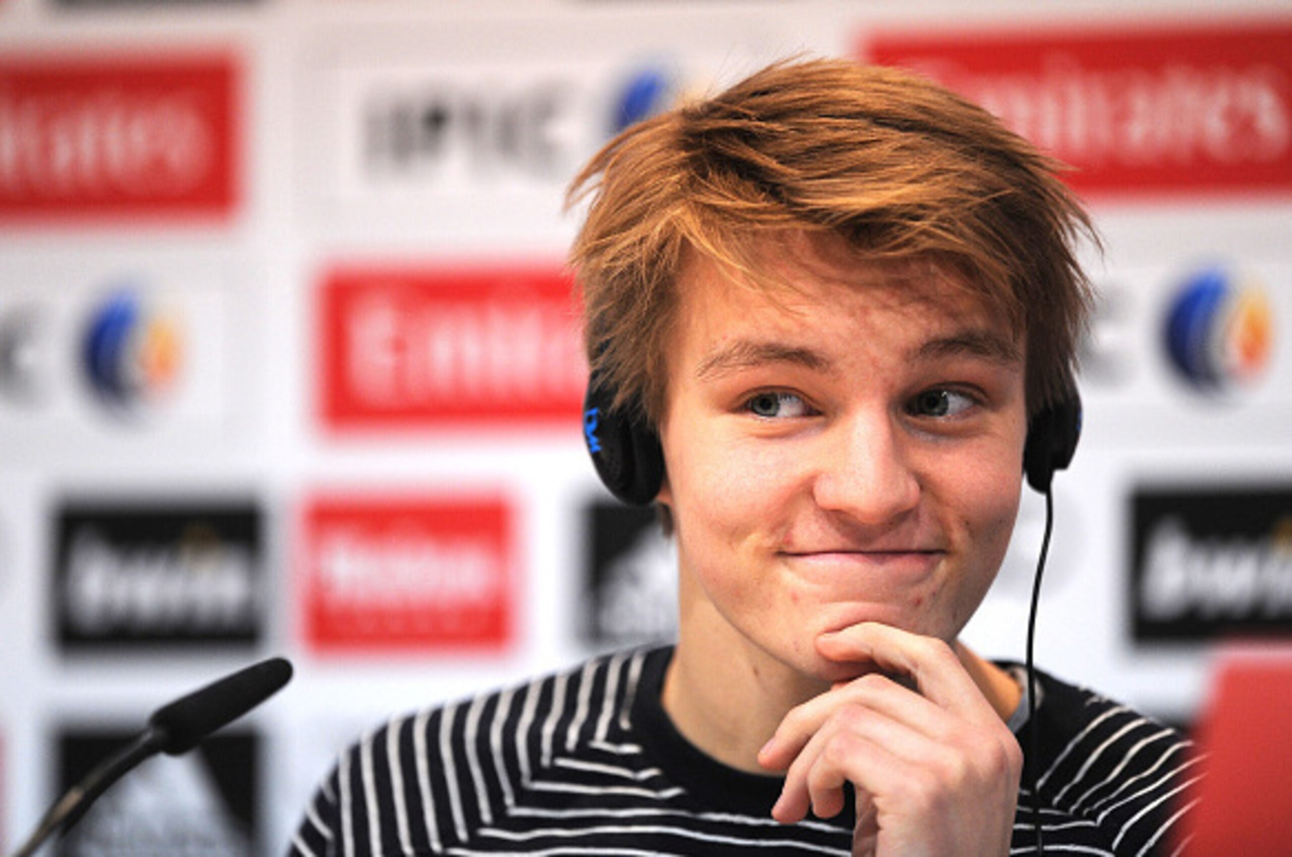 MADRID, SPAIN - JANUARY 22:  Martin Odegaard from Norway ponders a question during his press conference at Real Madrid's Valdebebas training grounds after he signed with Real on January 22, 2015 in Madrid, Spain. Odegaard aged 16 will play for Real's seco