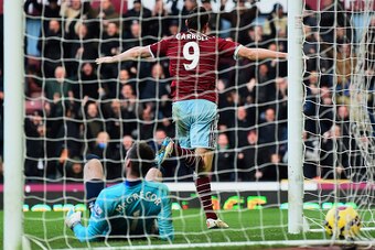 LONDON, ENGLAND - JANUARY 18:  Despair for goalkeeper Allan McGregor of Hull City as Andy Carroll of West Ham United celebrates scoring their first goal during the Barclays Premier League match between West Ham United and Hull City at Boleyn Ground on Jan
