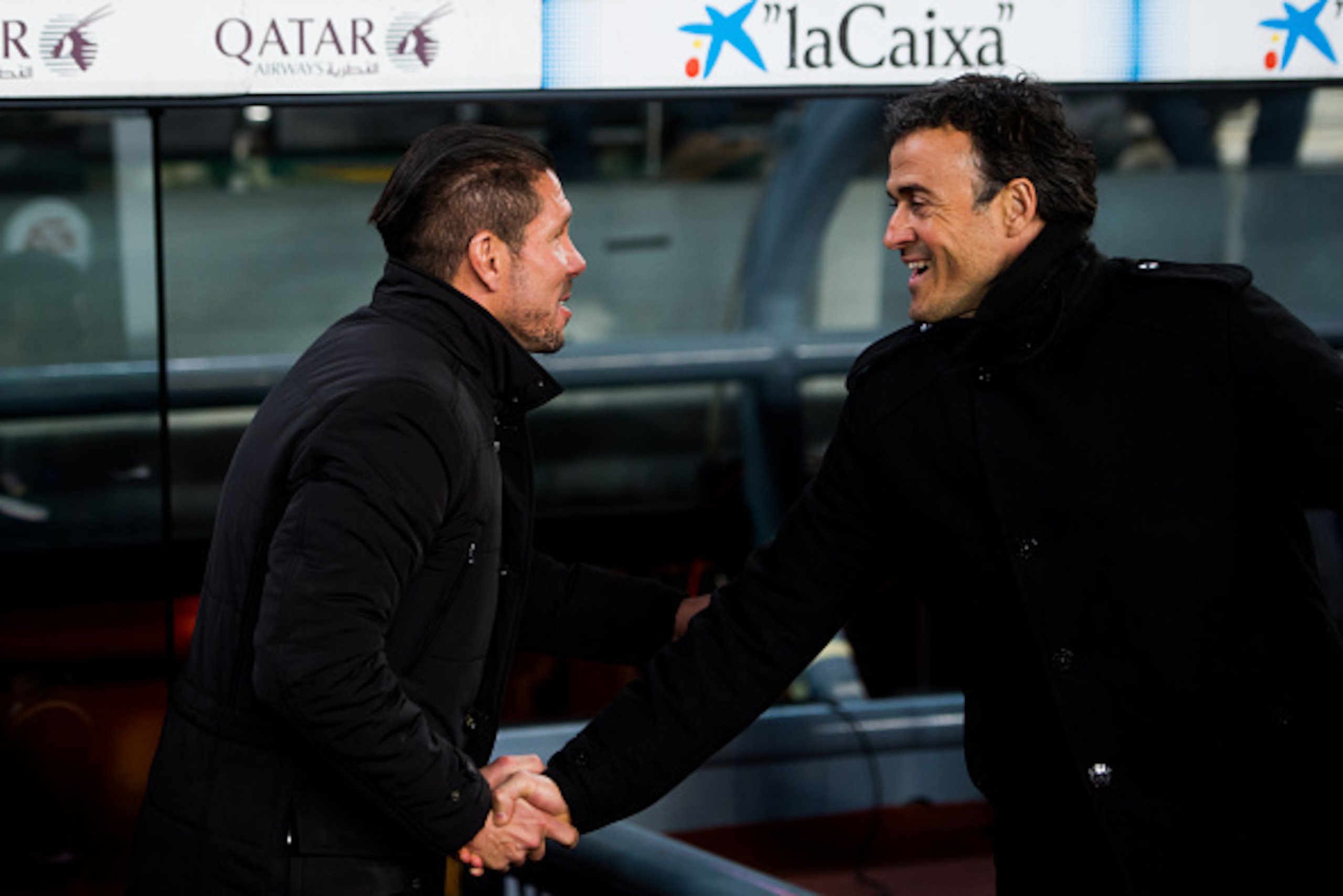 BARCELONA, SPAIN - JANUARY 21:  Head coach Diego Pablo Simeone (L) of Club Atletico de Madrid shakes hands with Head coach Luis Enrique Martinez of FC Barcelona during the Copa del Rey Quarter-Final First Leg match between FC Barcelona and Club Atletico d