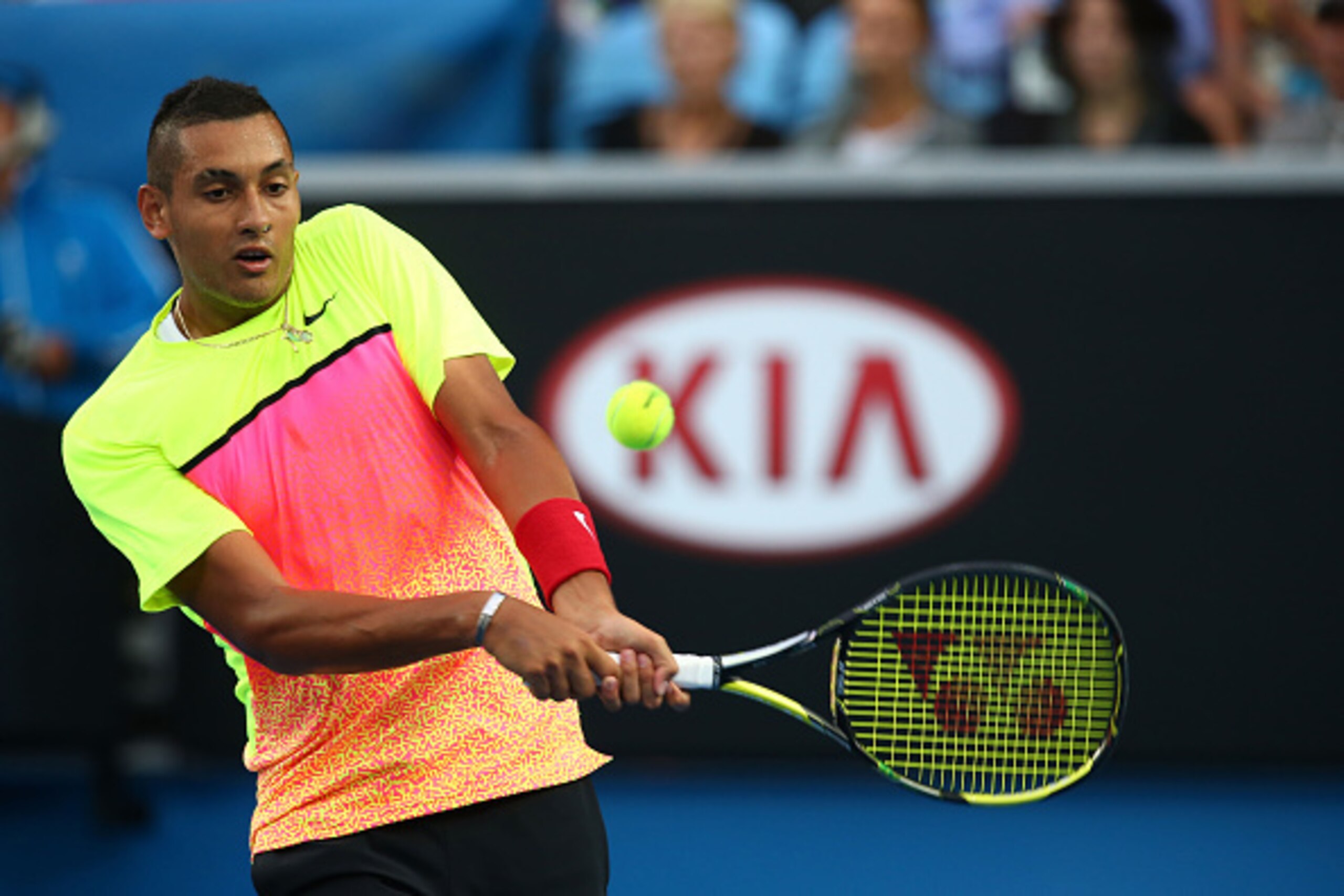 MELBOURNE, AUSTRALIA - JANUARY 23:  Nick Kyrgios of Australia plays a backhand in his third round match against Malek Jaziri of Tunisia during day five of the 2015 Australian Open at Melbourne Park on January 23, 2015 in Melbourne, Australia.  (Photo by C