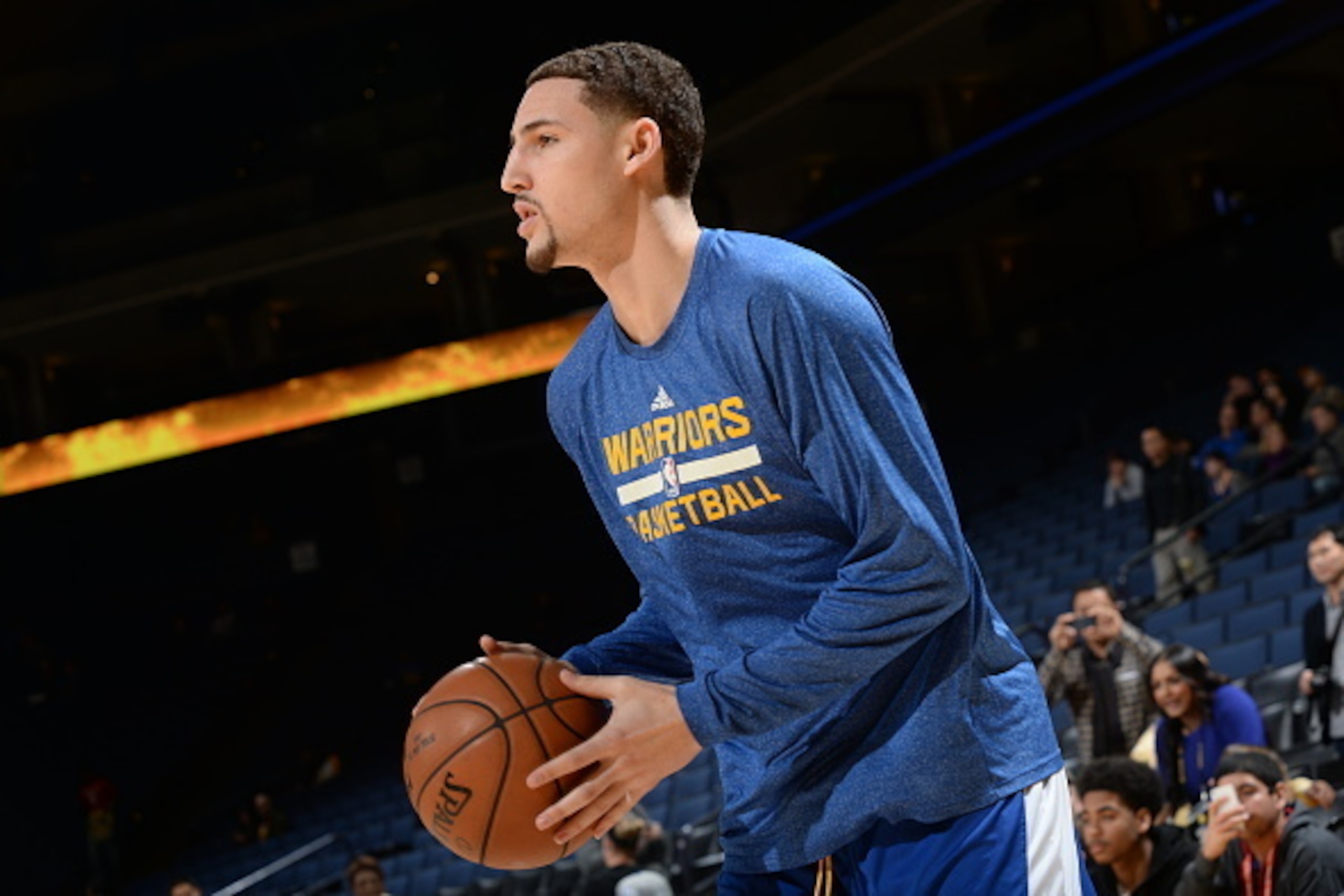 OAKLAND, CA - JANUARY 21: Klay Thompson #11 of the Golden State Warriors warms up before the game against the Houston Rockets on January 21, 2015 at Oracle Arena in Oakland, California. NOTE TO USER: User expressly acknowledges and agrees that, by downlo OAKLAND, CA - JANUARY 21: Klay Thompson #11 of the Golden State Warriors warms up before the game against the Houston Rockets on January 21, 2015 at Oracle Arena in Oakland, California. NOTE TO USER: User expressly acknowledges and agrees that, by downlo