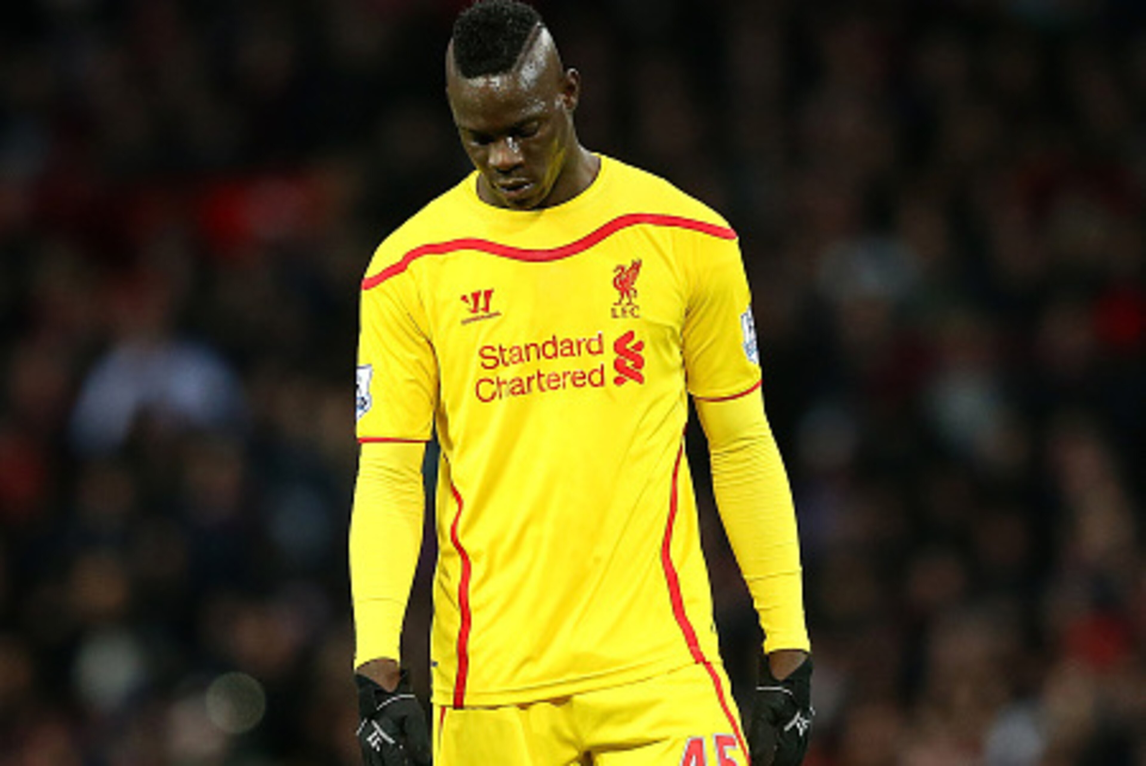 MANCHESTER, ENGLAND - DECEMBER 14:  Mario Balotelli of Liverpool shows his dejection during the Barclays Premier League match between Manchester United and Liverpool at Old Trafford on December 14, 2014 in Manchester, England.  (Photo by Alex Livesey/Gett
