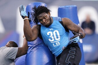 INDIANAPOLIS, IN - FEBRUARY 27: Linebacker Courtney Upshaw of Alabama takes part in a drill during the 2012 NFL Combine at Lucas Oil Stadium on February 27, 2012 in Indianapolis, Indiana. (Photo by Joe Robbins/Getty Images)