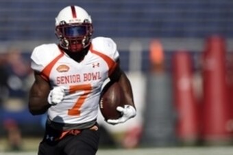 Jan 21, 2015; Mobile, AL, USA;  North squad wide receiver Ty Montgomery of Stanford (7) carries the ball up the field  during North squad Senior Bowl practice at Ladd-Peebles Stadium. Mandatory Credit: John David Mercer-USA TODAY Sports