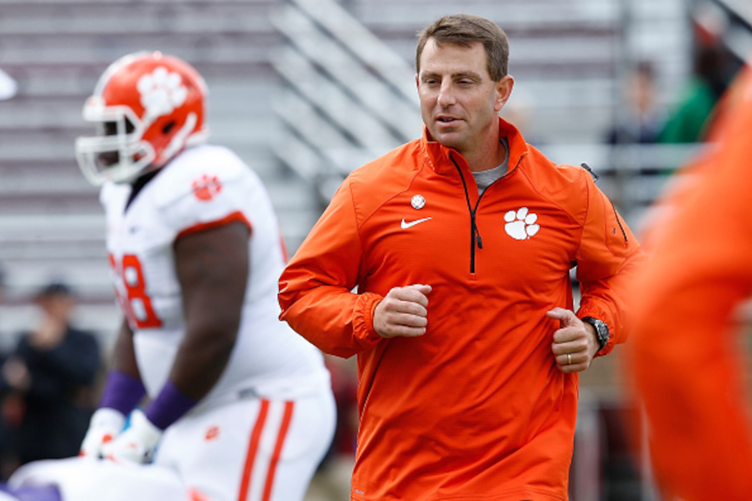 CHESTNUT HILL, MA - OCTOBER 18:  Dabo Swinney of the Clemson Tigers leads his team during a practice snap before a game with the Boston College Eagles at Alumni Stadium on October 18, 2014 in Chestnut Hill, Massachusetts. (Photo by Jim Rogash/Getty Images