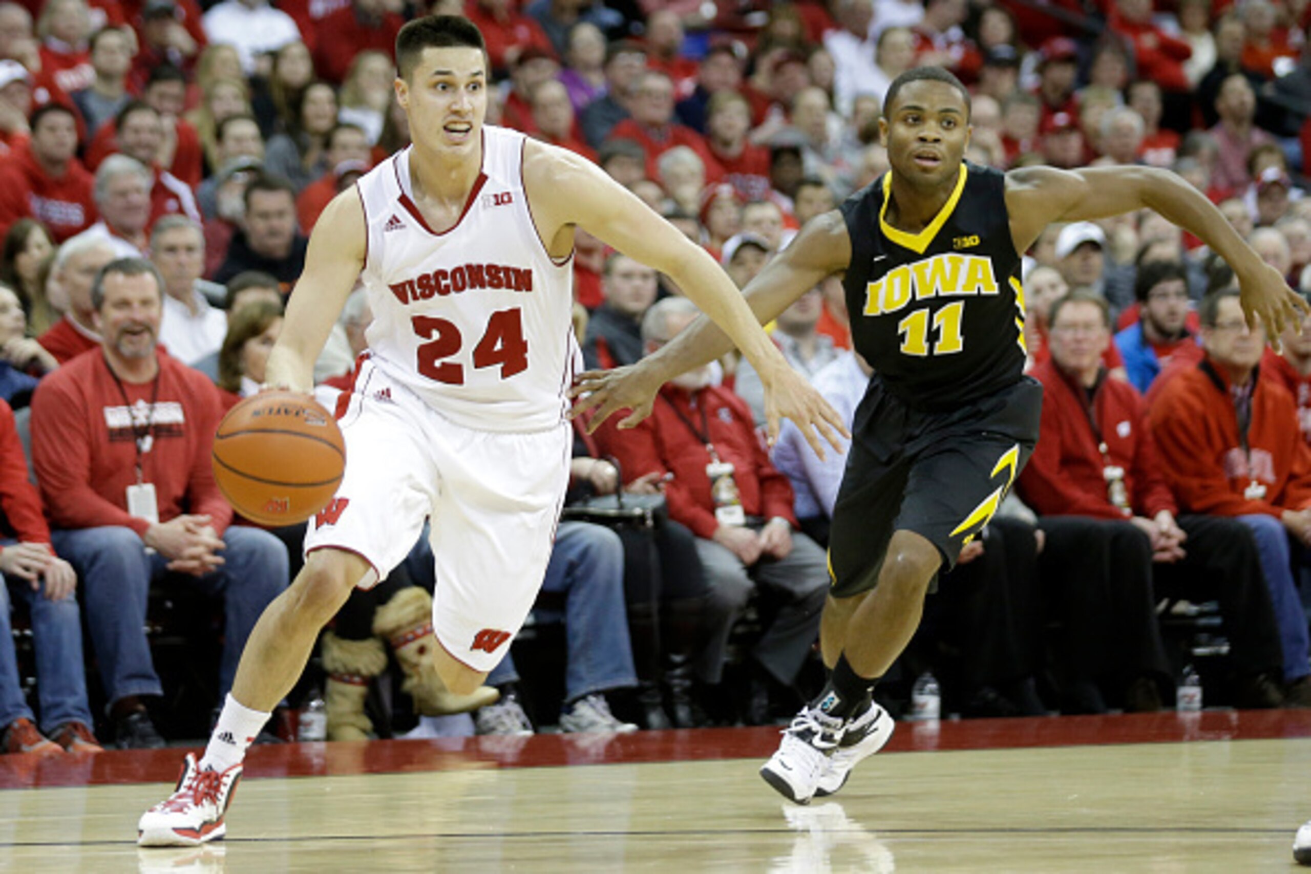 MADISON, WI - JANUARY 20:  Bronson Koenig #24 of the Wisconsin Badgers drives to the basket during the second half against the Iowa Hawkeyes at Kohl Center on January 20, 2015 in Madison, Wisconsin. (Photo by Mike McGinnis/Getty Images)
