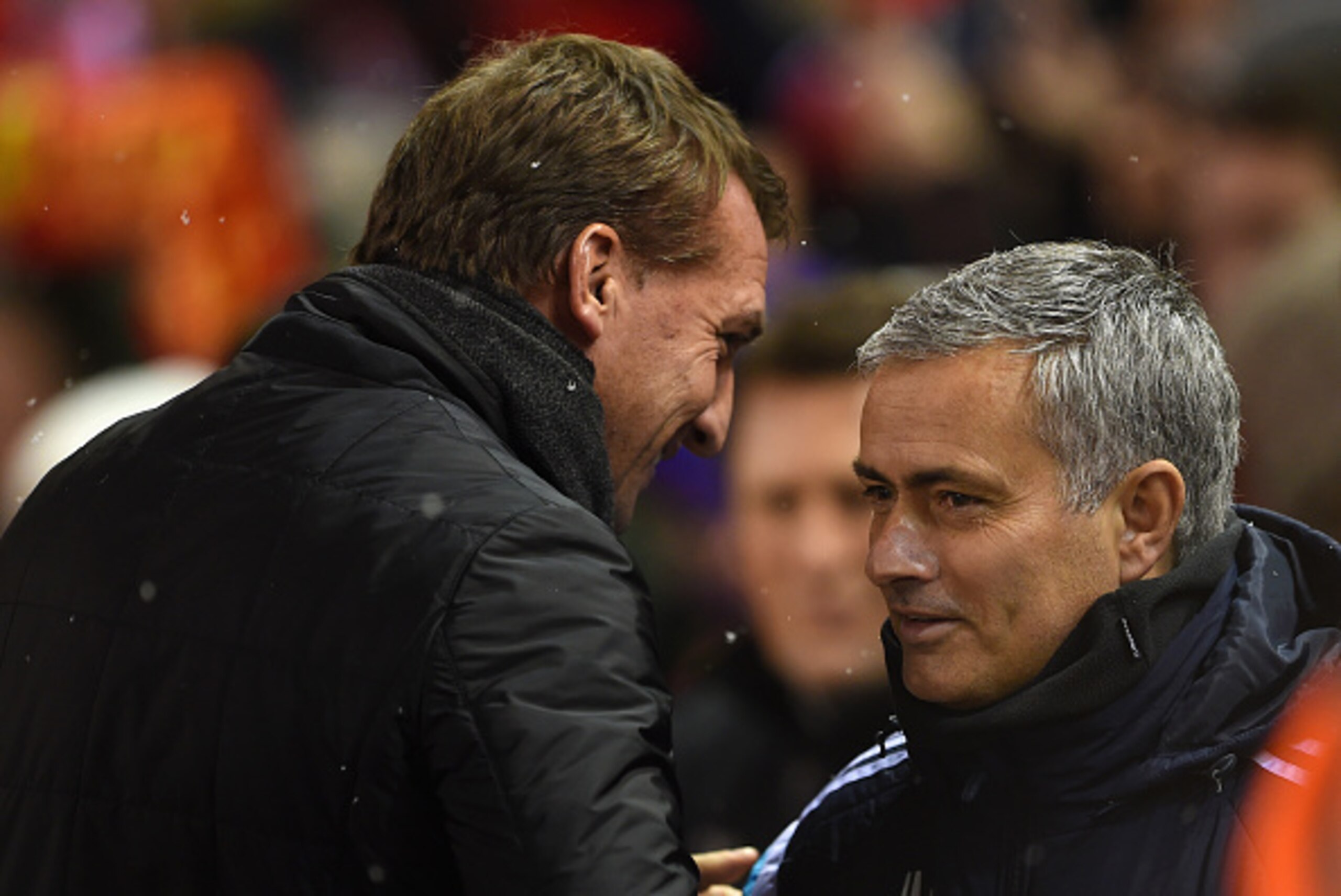 LIVERPOOL, ENGLAND - JANUARY 20:  Brendan Rodgers, manager of Liverpool greets Jose Mourinho manager of Chelsea during the Capital One Cup Semi-Final first leg match between Liverpool and Chelsea at Anfield on January 20, 2015 in Liverpool, England.  (Pho