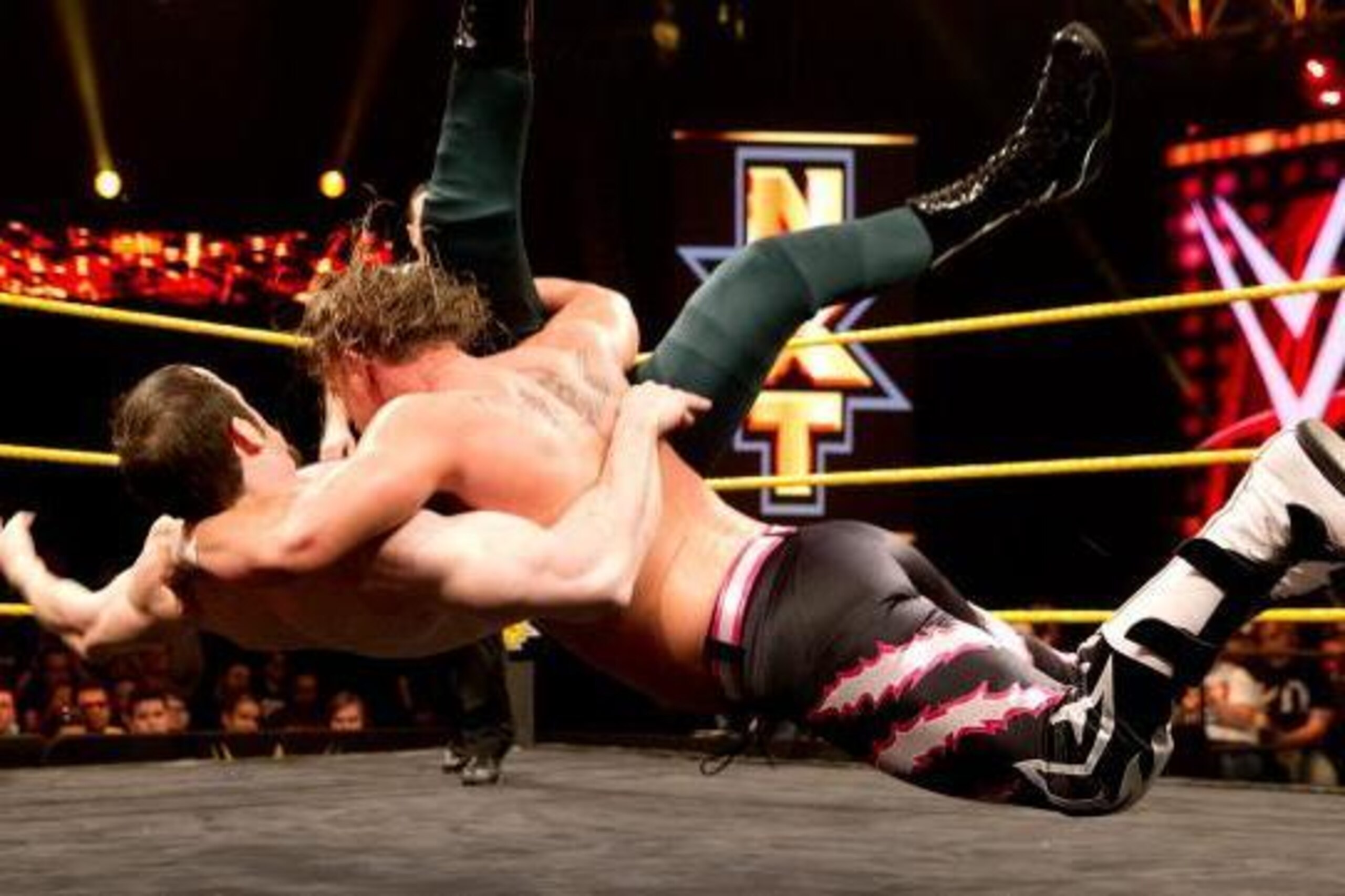 Wesley Blake slams Aiden English to the mat.