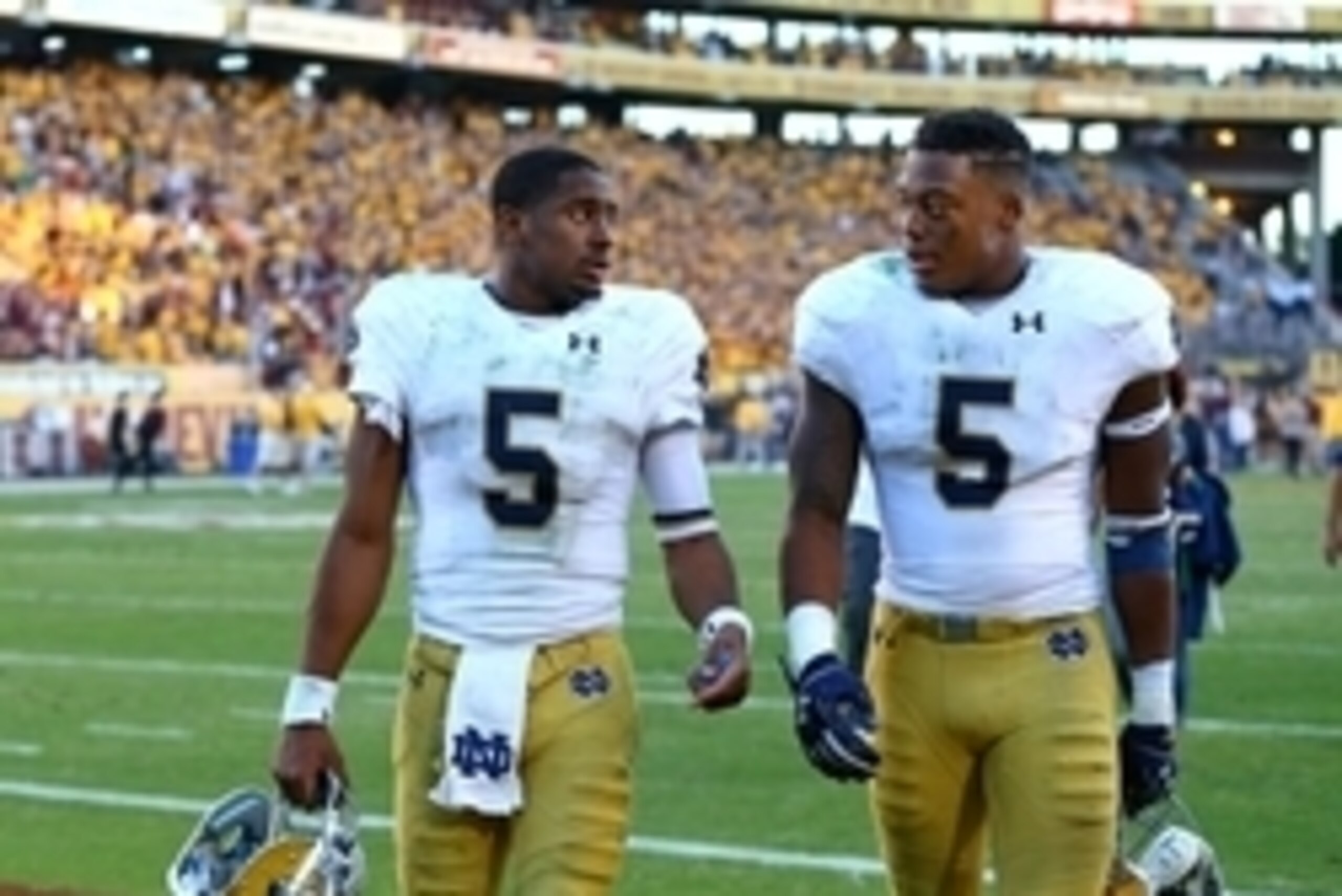 Nov 8, 2014; Tempe, AZ, USA; Notre Dame Fighting Irish quarterback Everett Golson (left) and linebacker Nyles Morgan following the game against the Arizona State Sun Devils at Sun Devil Stadium. Arizona State defeated Notre Dame 55-31. Mandatory Credit: M Nov 8, 2014; Tempe, AZ, USA; Notre Dame Fighting Irish quarterback Everett Golson (left) and linebacker Nyles Morgan following the game against the Arizona State Sun Devils at Sun Devil Stadium. Arizona State defeated Notre Dame 55-31. Mandatory Credit: M