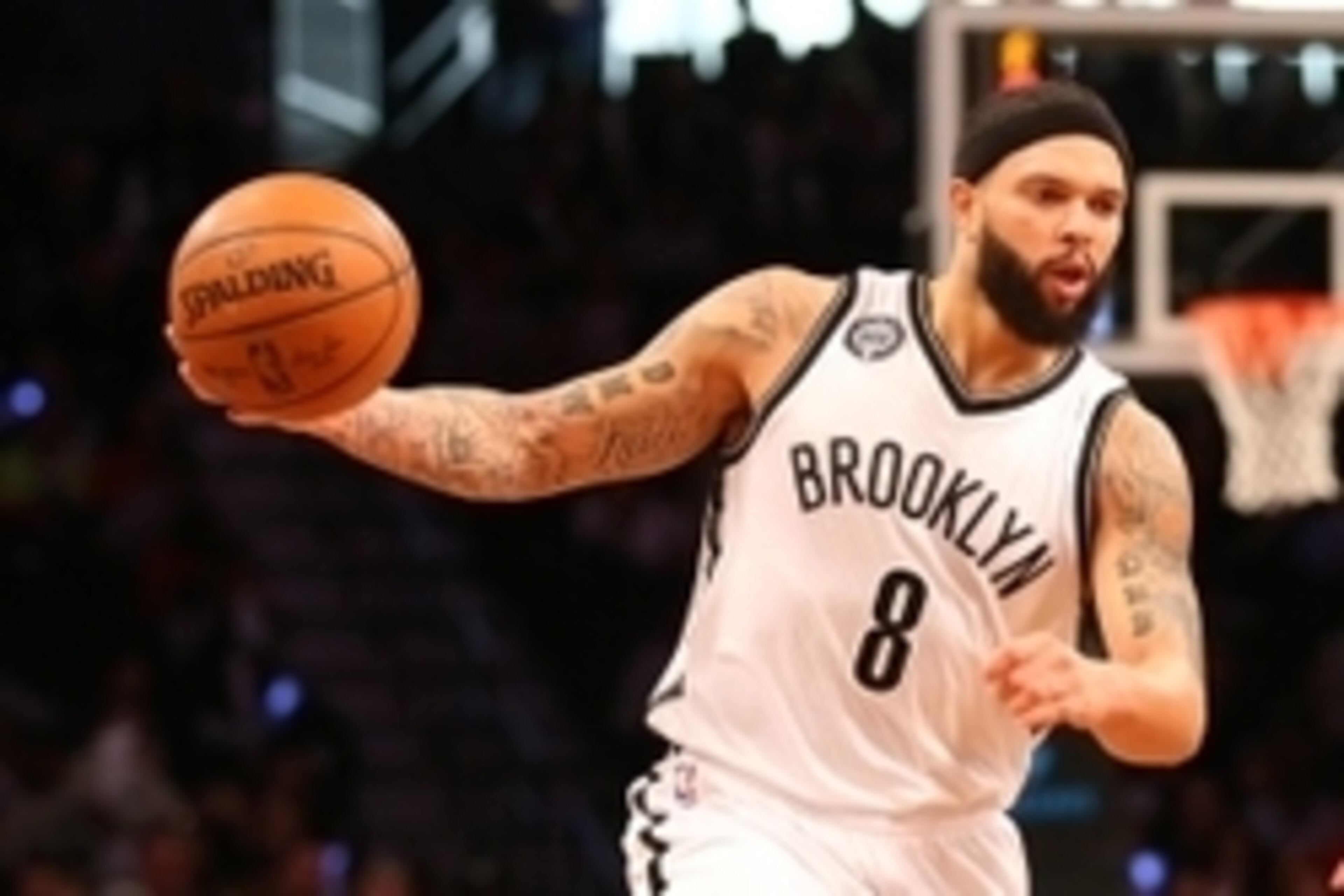 Dec 12, 2014; Brooklyn, NY, USA;  Brooklyn Nets guard Deron Williams (8) moves the ball during the third quarter against the Philadelphia 76ers at Barclays Center. Brooklyn Nets won 88-70. Mandatory Credit: Anthony Gruppuso-USA TODAY Sports