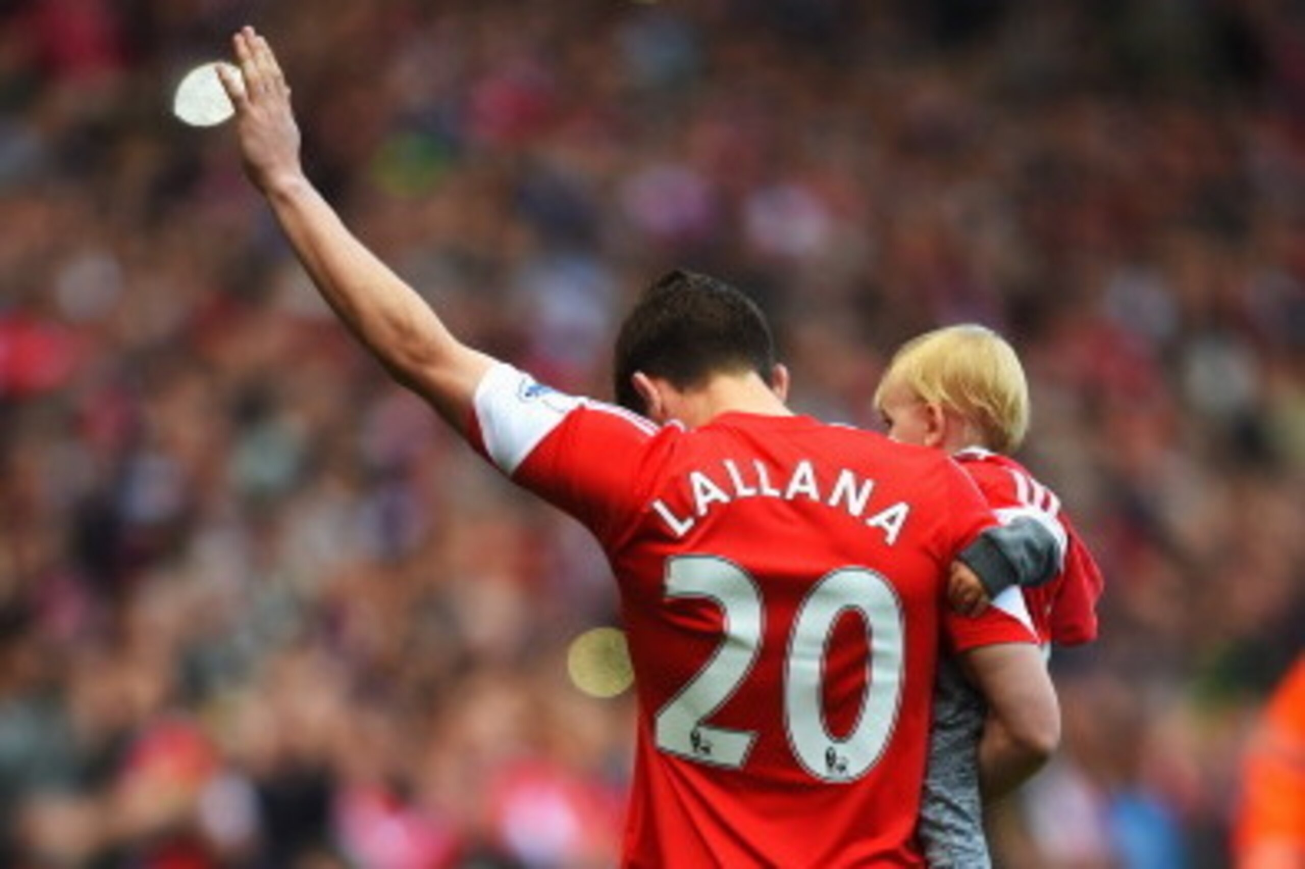 SOUTHAMPTON, ENGLAND - MAY 11:  Adam Lallana of Southampton walks on the pitch following the Barclays Premier League match between Southampton and Manchester United at St Mary's Stadium on May 11, 2014 in Southampton, England.  (Photo by Mike Hewitt/Getty