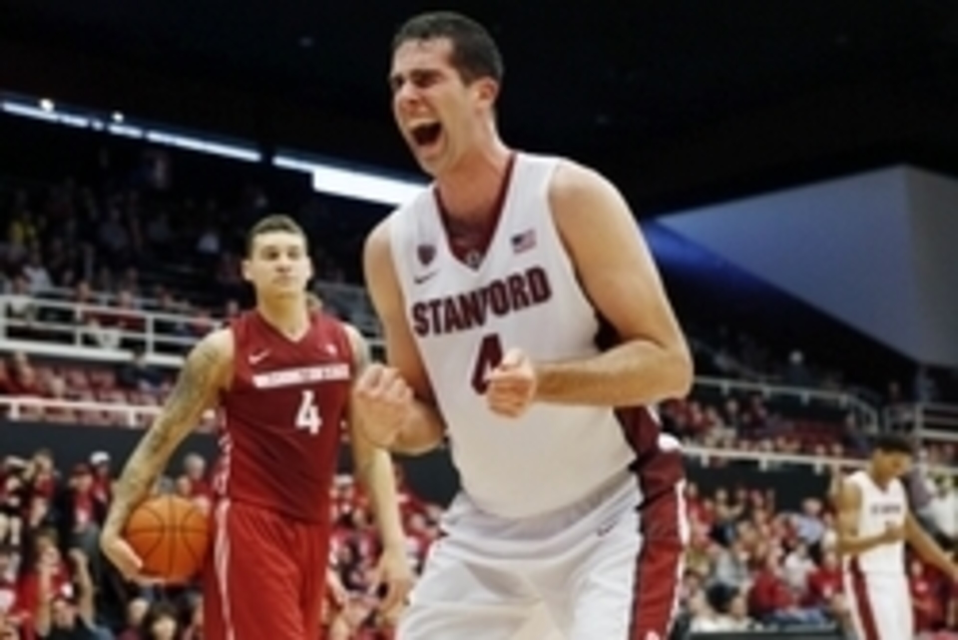 Jan 2, 2015; Stanford, CA, USA; Stanford Cardinal center Stefan Nastic (4) celebrates after scoring a dunk over Washington State Cougars center Jordan Railey (4) during the second half at Maples Pavilion. Stanford won 71-56. Mandatory Credit: Bob Stanton-