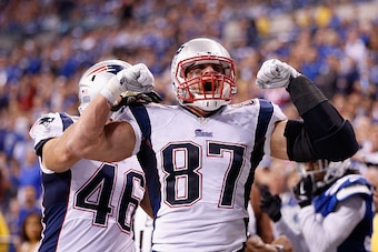 INDIANAPOLIS, IN - NOVEMBER 16:  Rob Gronkowski #87 of the New England Patriots celebrates his touchdown against the Indianapolis Colts during the fourth quarter of the game at Lucas Oil Stadium on November 16, 2014 in Indianapolis, Indiana.  (Photo by Jo