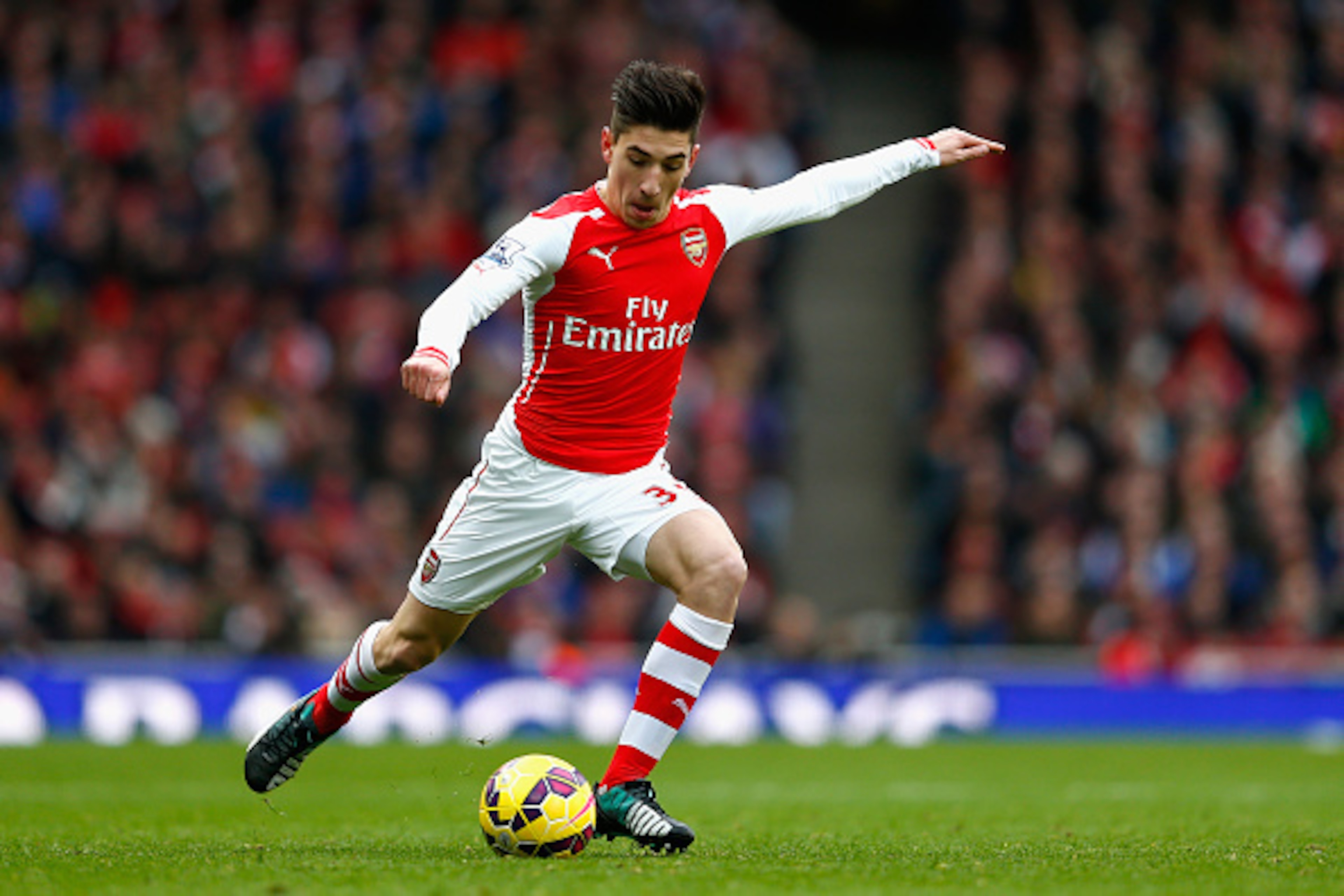 LONDON, ENGLAND - JANUARY 11:  Hector Bellerin of Arsenal in action during the Barclays Premier League match between Arsenal and Stoke City at the Emirates Stadium on January 11, 2015 in London, England.  (Photo by Julian Finney/Getty Images)