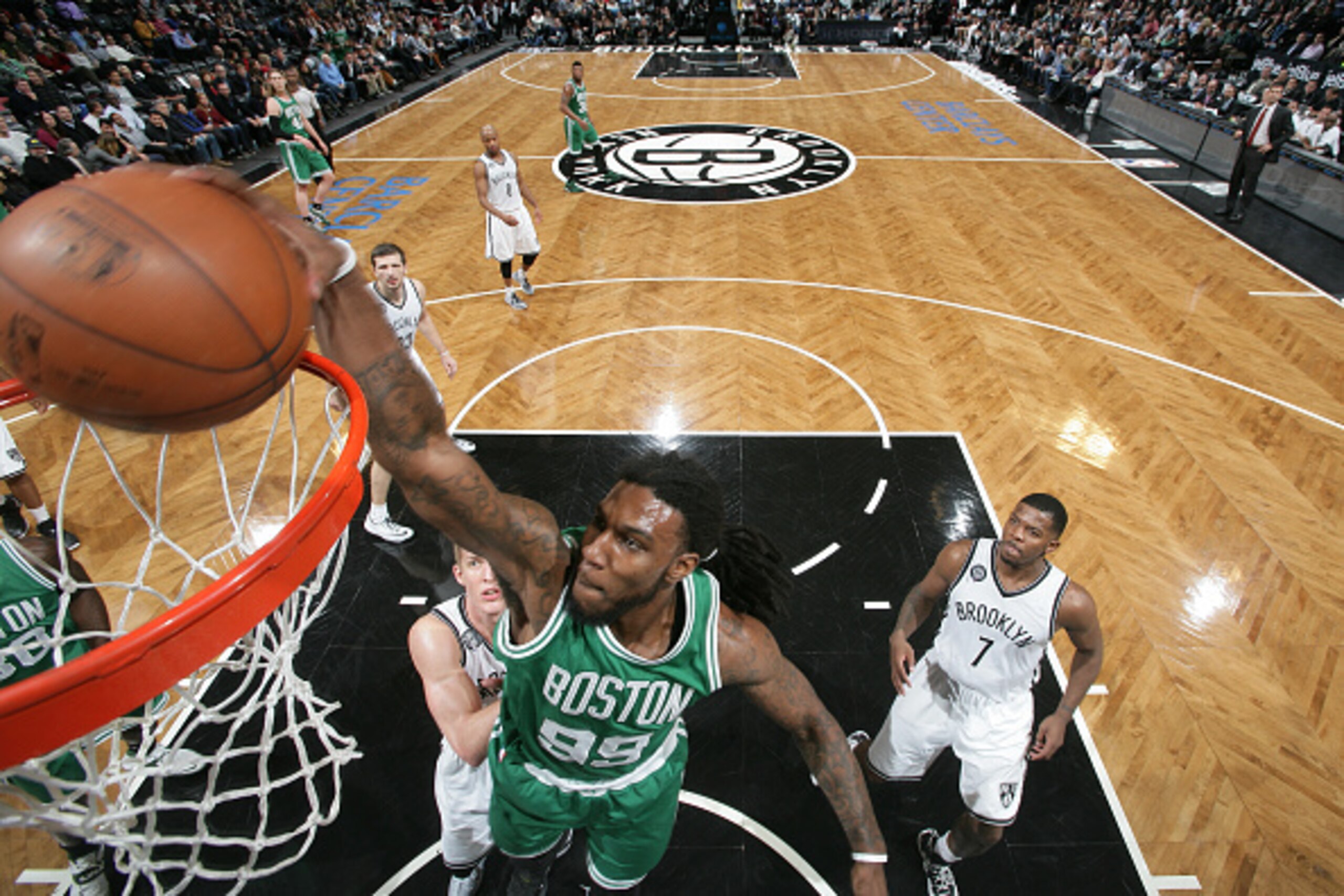 BROOKLYN, NY - JANUARY 7:  Jae Crowder #99 of the Boston Celtics dunks against the Brooklyn Nets during the game on January 7, 2015 at Barclays Center in Brooklyn, New York. NOTE TO USER: User expressly acknowledges and agrees that, by downloading and or 