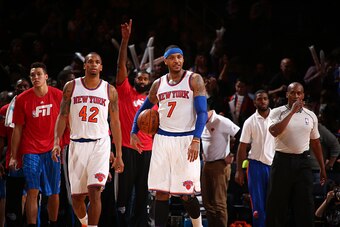 NEW YORK, NY - JANUARY 23:  Lance Thomas #42 and Carmelo Anthony #7 of the New York Knicks during the game against the Orlando Magic on January 23, 2015 at Madison Square Garden in New York City, New York.  NOTE TO USER: User expressly acknowledges and ag