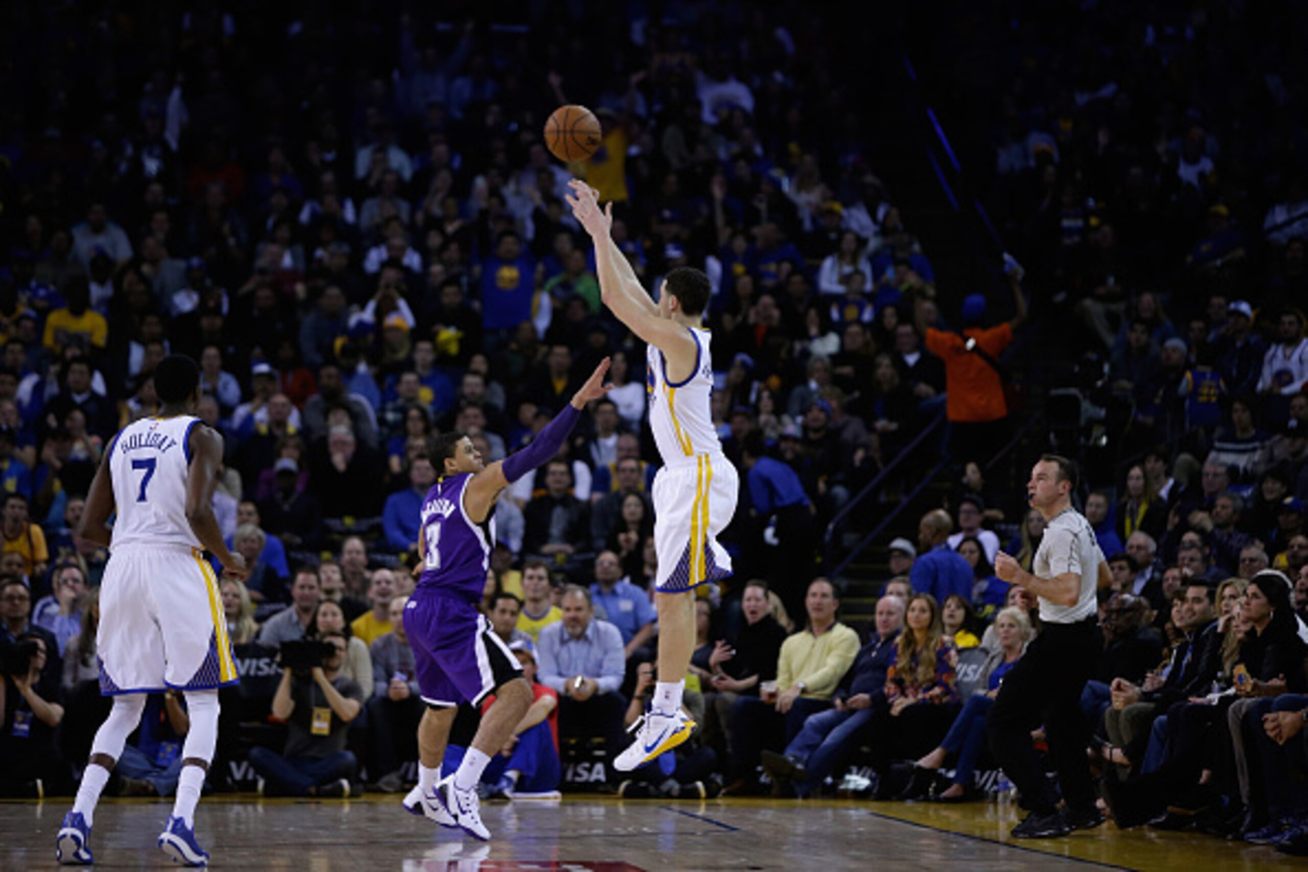 OAKLAND, CA - JANUARY 23: Klay Thompson #11 of the Golden State Warriors shoots over Ray McCallum #3 of the Sacramento Kings in the third quarter at ORACLE Arena on January 23, 2015 in Oakland, California. Thompson scored 37 points in the third quarter t OAKLAND, CA - JANUARY 23: Klay Thompson #11 of the Golden State Warriors shoots over Ray McCallum #3 of the Sacramento Kings in the third quarter at ORACLE Arena on January 23, 2015 in Oakland, California. Thompson scored 37 points in the third quarter t