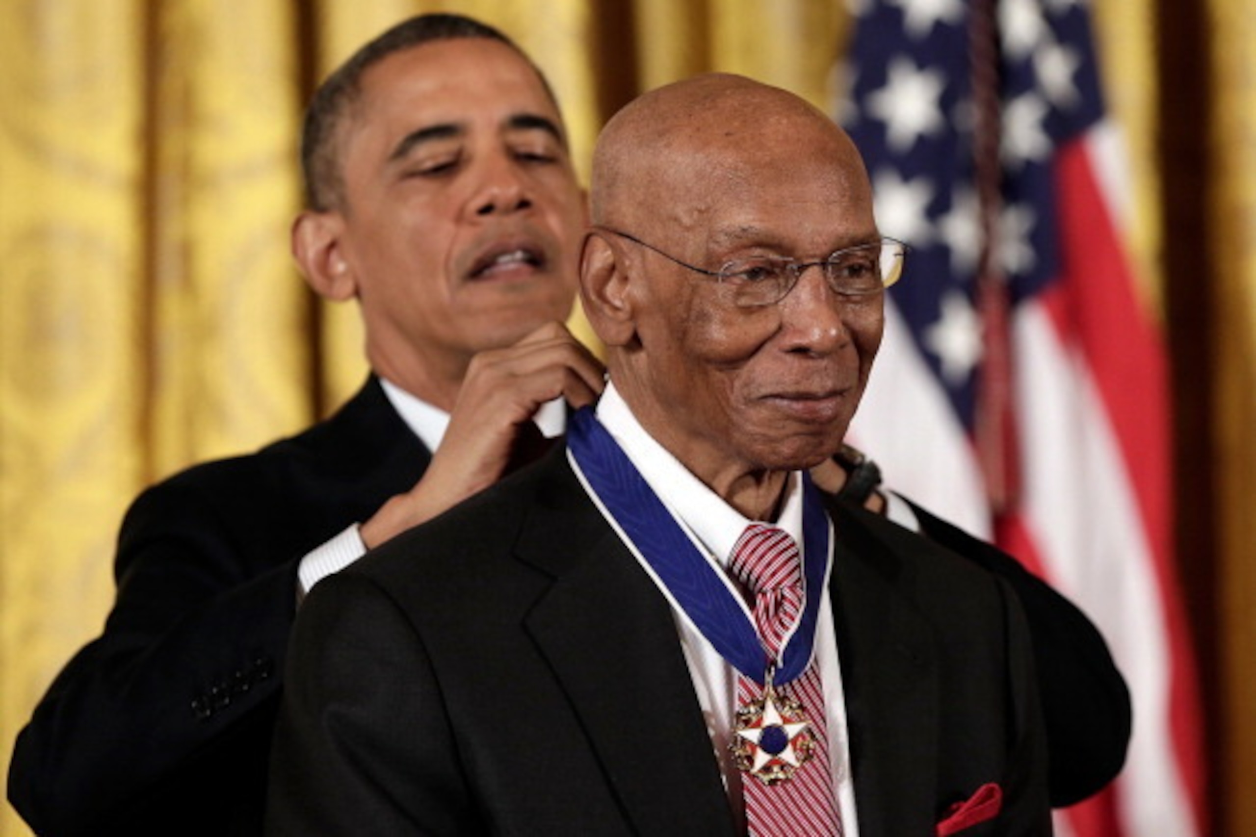 WASHINGTON, DC - NOVEMBER 20:  U.S. President Barack Obama awards the Presidential Medal of Freedom to Hall of Fame baseball player Ernie Banks in the East Room at the White House on November 20, 2013 in Washington, DC. The Presidential Medal of Freedom i