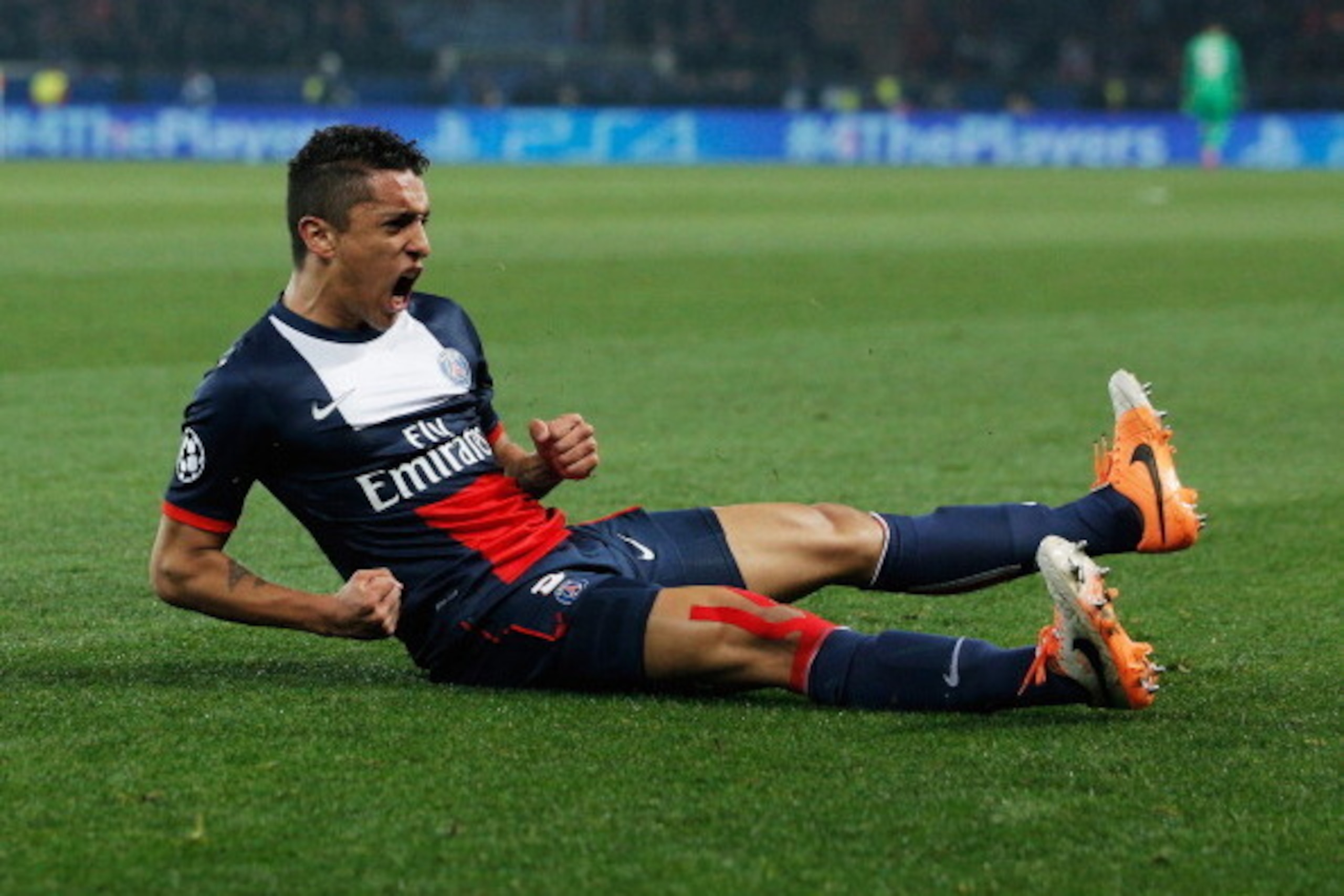 PARIS, FRANCE - MARCH 12:  Marquinhos of Paris Saint-Germain celebrates as he scores their first goal during the UEFA Champions League Round of 16 second leg match between Paris Saint-Germain FC and Bayer Leverkusen at Parc des Princes on March 12, 2014 i