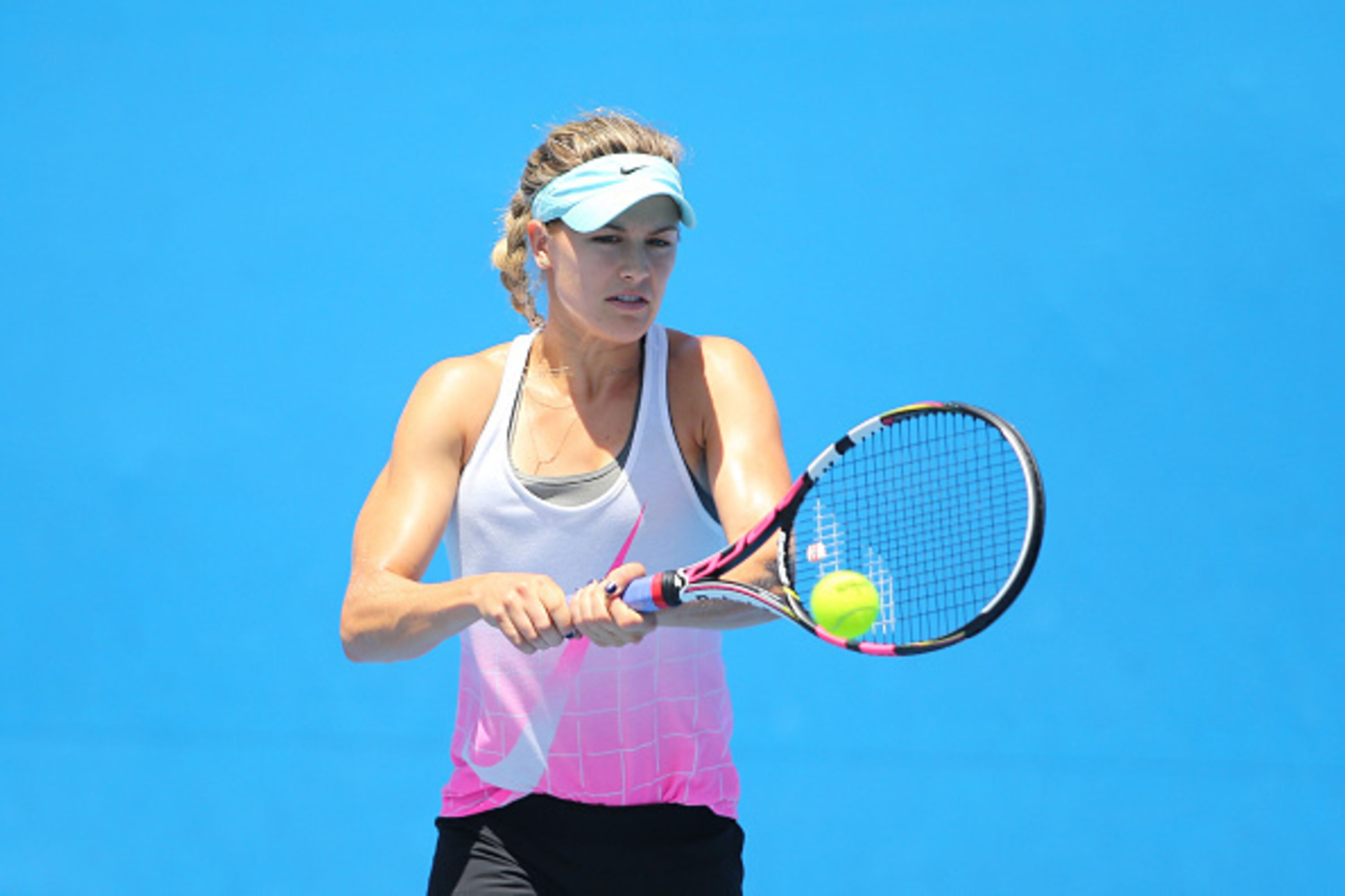 MELBOURNE, AUSTRALIA - JANUARY 24:  Eugenie Bouchard of Canada plays a backhand in a practice session during day six of the 2015 Australian Open at Melbourne Park on January 24, 2015 in Melbourne, Australia.  (Photo by Patrick Scala/Getty Images)
