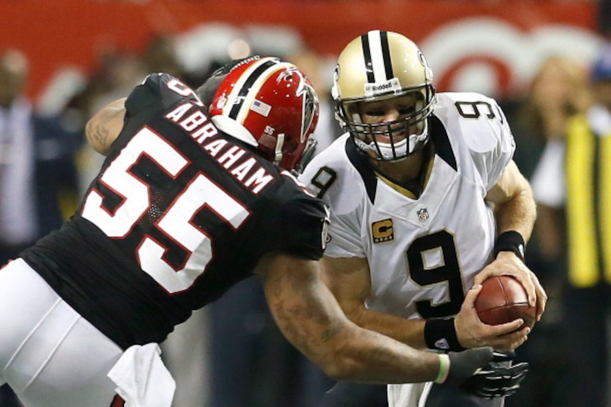 ATLANTA, GA - NOVEMBER 29:  John Abraham #55 of the Atlanta Falcons sacks Drew Brees #9 of the New Orleans Saints at Georgia Dome on November 29, 2012 in Atlanta, Georgia.  (Photo by Kevin C. Cox/Getty Images)