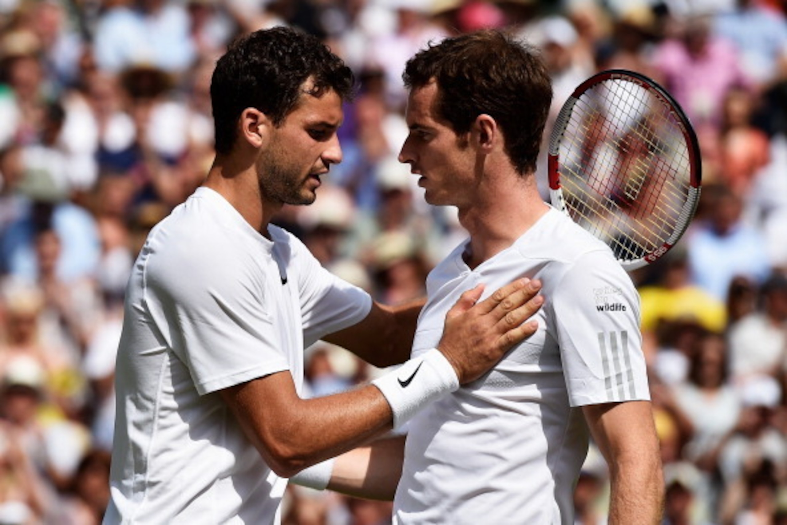 LONDON, ENGLAND - JULY 02:  Andy Murray of Great Britain and Grigor Dimitrov of Bulgaria after their Gentlemen's Singles quarter-final match on day nine of the Wimbledon Lawn Tennis Championships at the All England Lawn Tennis and Croquet Club  at Wimbled