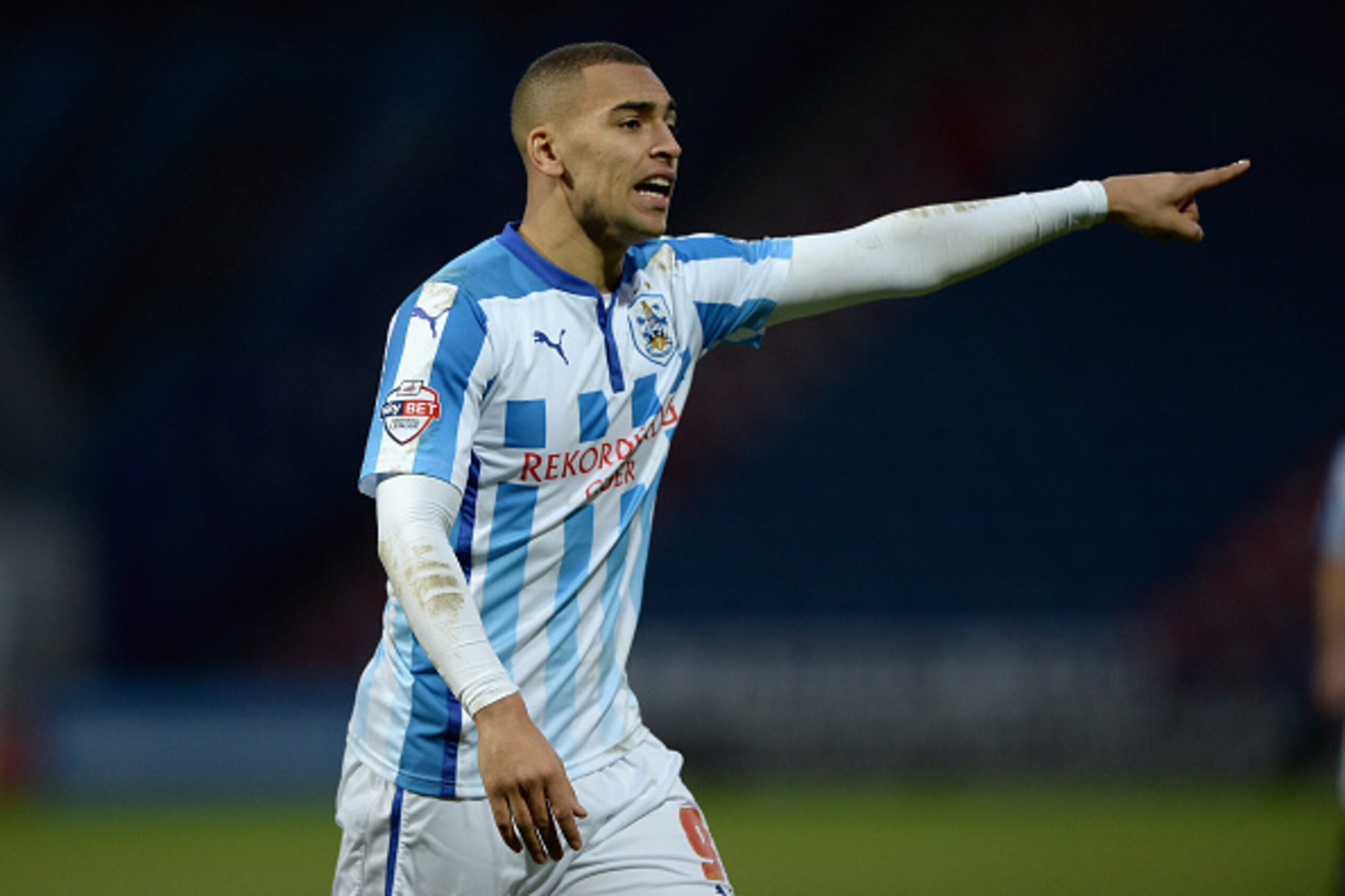 HUDDERSFIELD, ENGLAND - JANUARY 03: James Vaughan of Huddersfield during the FA Cup Third Round match between Huddersfield Town and Reading at Galpharm Stadium on January 3, 2015 in Huddersfield, England. (Photo by Gareth Copley/Getty Images) HUDDERSFIELD, ENGLAND - JANUARY 03: James Vaughan of Huddersfield during the FA Cup Third Round match between Huddersfield Town and Reading at Galpharm Stadium on January 3, 2015 in Huddersfield, England. (Photo by Gareth Copley/Getty Images)
