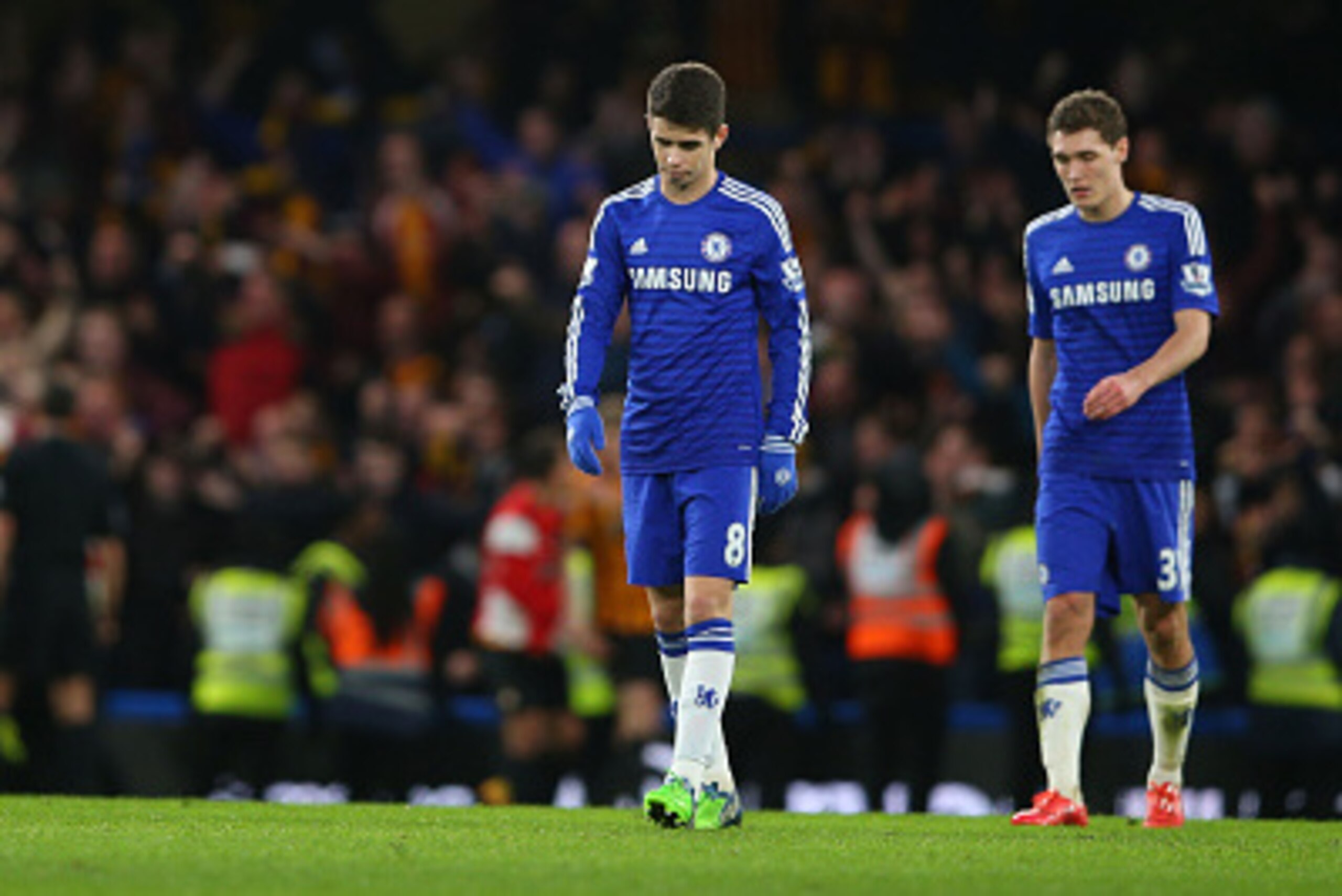 LONDON, ENGLAND - JANUARY 24:  Dejected Chelsea players react following their team's 4-2 defeat during the FA Cup Fourth Round match between Chelsea and Bradford City at Stamford Bridge on January 24, 2015 in London, England.  (Photo by Paul Gilham/Getty 