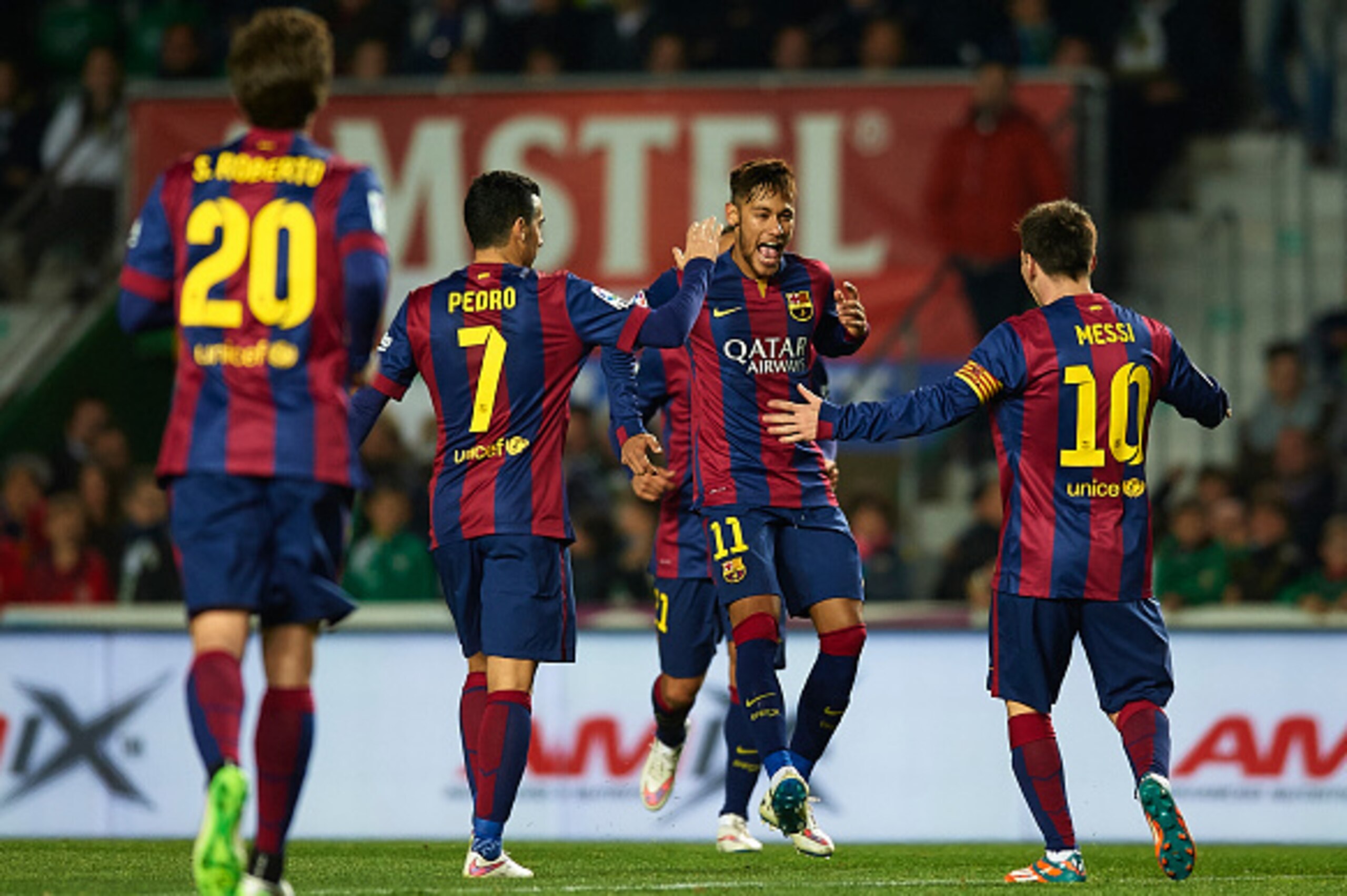 ELCHE, SPAIN - JANUARY 24:  Neymar JR of Barcelona celebrate scoring with his teammate Lionel Messi during the La Liga match between Elche FC and FC Barcelona at Estadio Manuel Martinez Valero on January 24, 2015 in Elche, Spain.  (Photo by Manuel Queimad