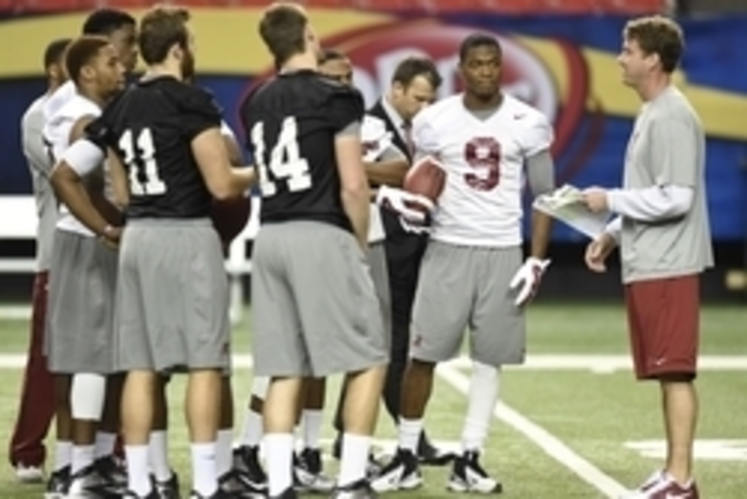 Dec 5, 2014; Atlanta, GA, USA; Alabama Crimson Tide wide receiver Amari Cooper (9) (with ball) listens as offensive coordinator Lane Kiffin, right, works with quarterbacks and receivers during practice at the Georgia Dome. Alabama plays the Missouri Tige Dec 5, 2014; Atlanta, GA, USA; Alabama Crimson Tide wide receiver Amari Cooper (9) (with ball) listens as offensive coordinator Lane Kiffin, right, works with quarterbacks and receivers during practice at the Georgia Dome. Alabama plays the Missouri Tige