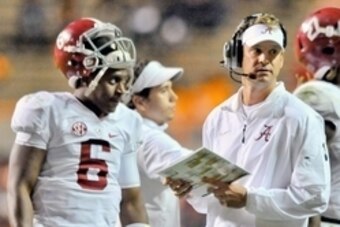 Oct 25, 2014; Knoxville, TN, USA; Alabama Crimson Tide quarterbacks offensive coordinator Lane Kiffin with Alabama quarterback Blake Sims (6) during a second half time out against the Tennessee Volunteers at Neyland Stadium. Alabama won 34-20. Mandatory C
