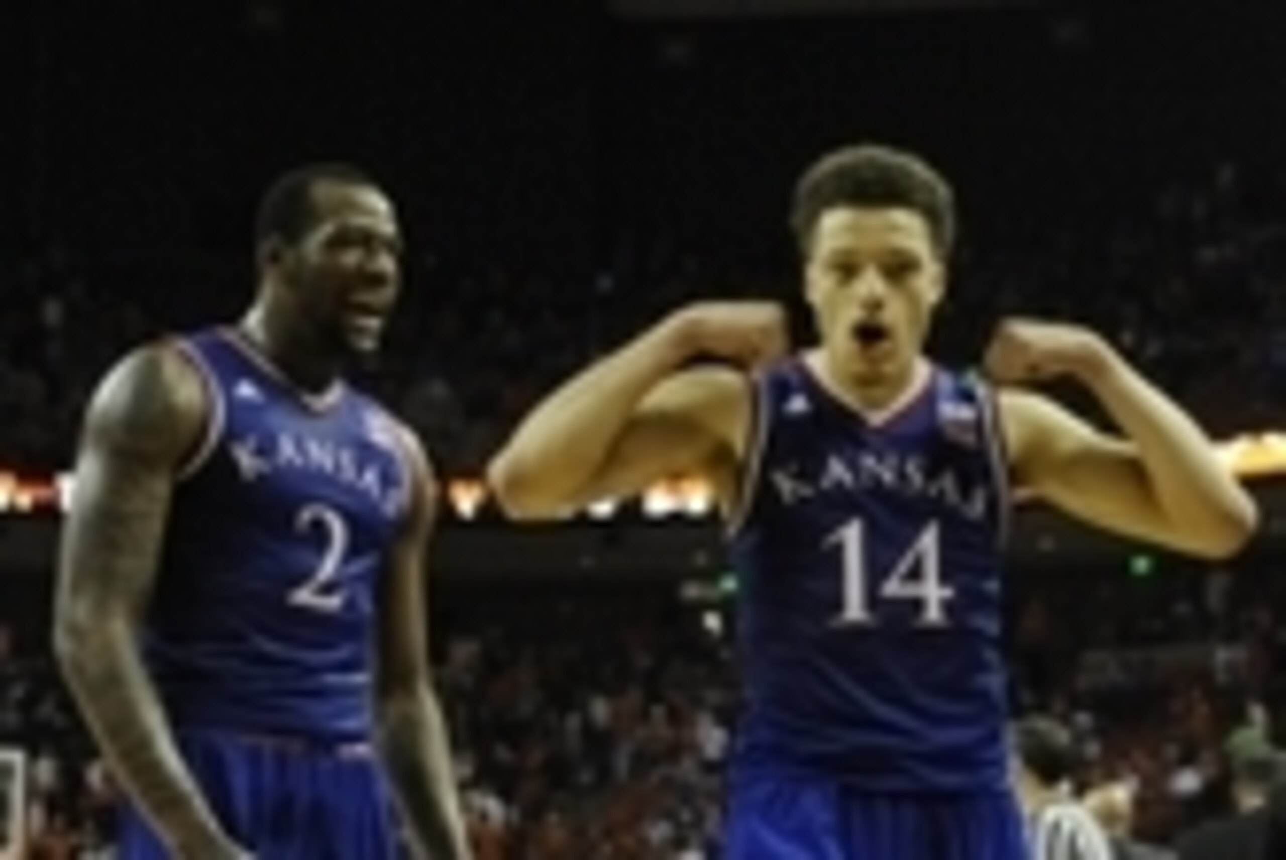 Jan 24, 2015; Austin, TX, USA; Kansas Jayhawks guard Brannen Greene (14) and forward Cliff Alexander (2) celebrate during the second half against the Texas Longhorns at the Frank Erwin Special Events Center. The Jayhawks won 75-62. Mandatory Credit: Brend
